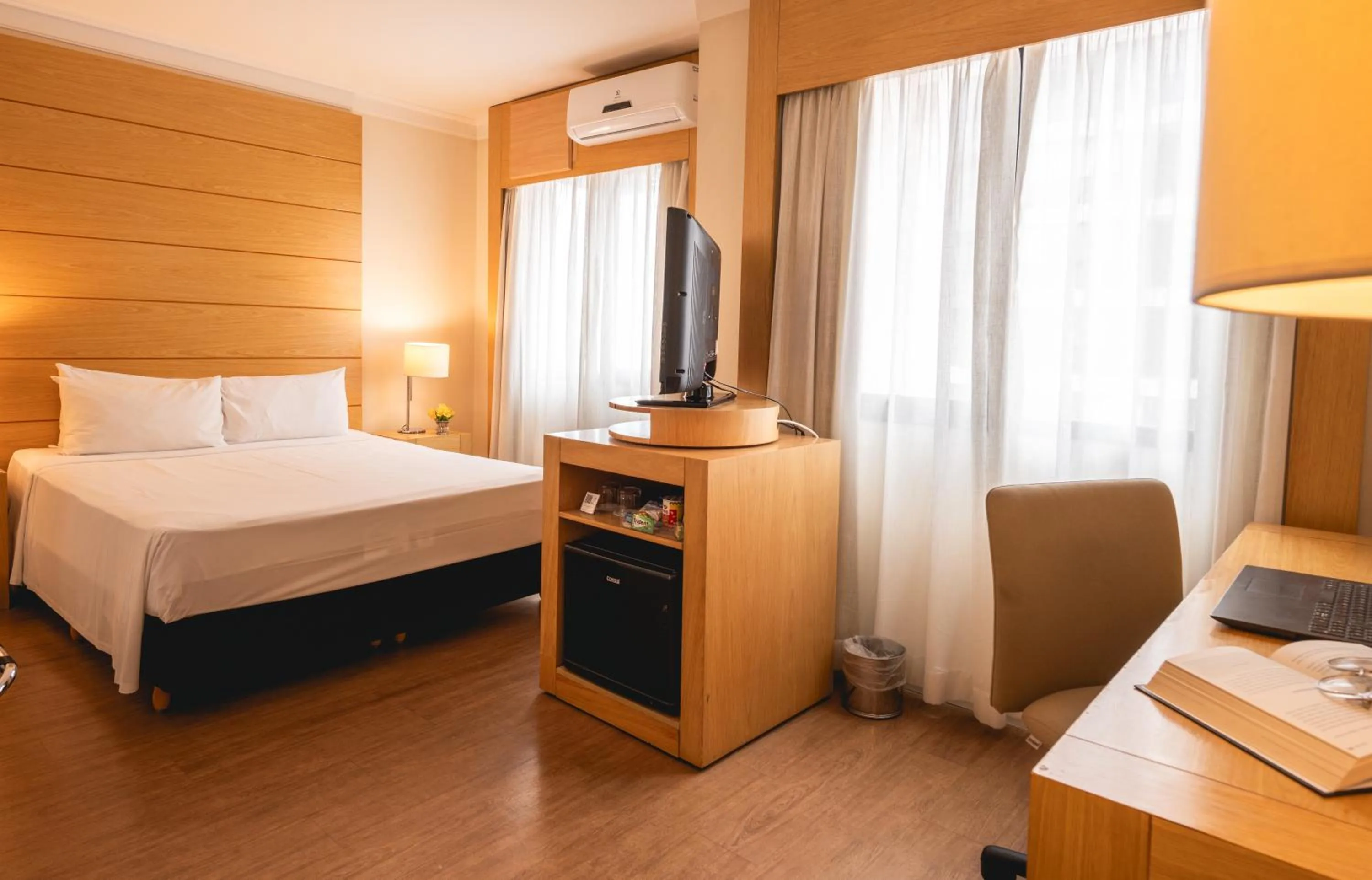 Bed in eSuítes Congonhas by Atlantica