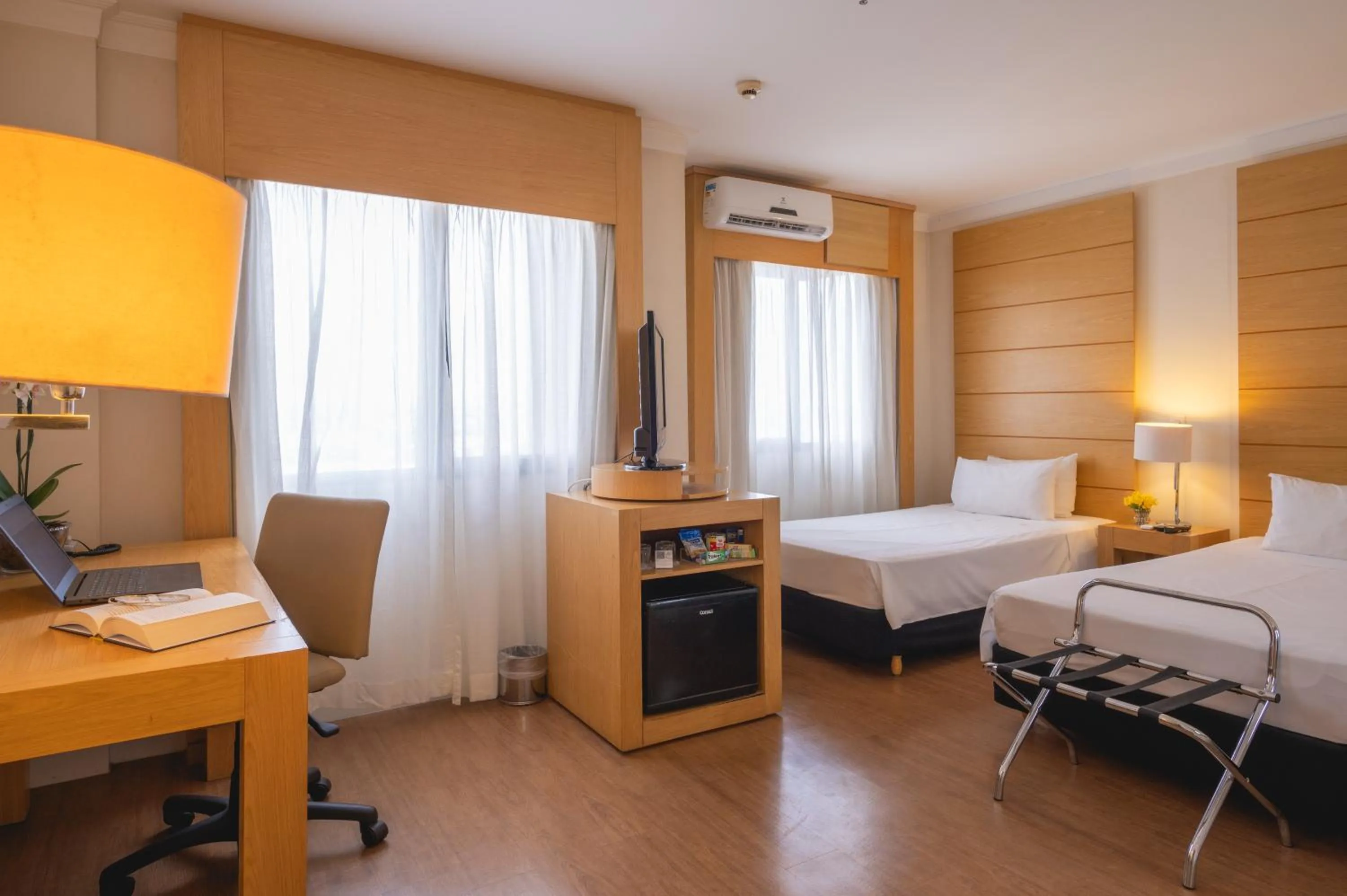 Bed in eSuítes Congonhas by Atlantica