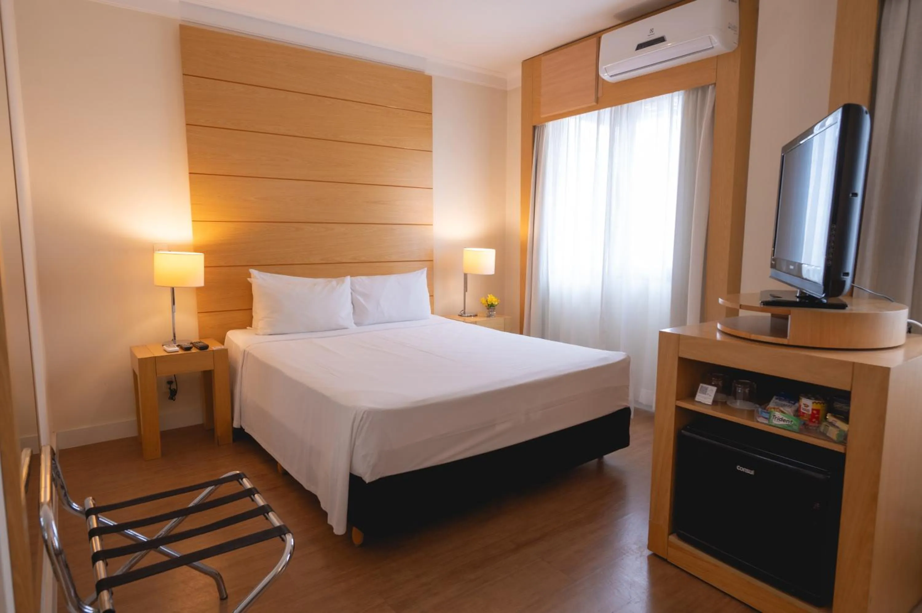 Bed in eSuítes Congonhas by Atlantica