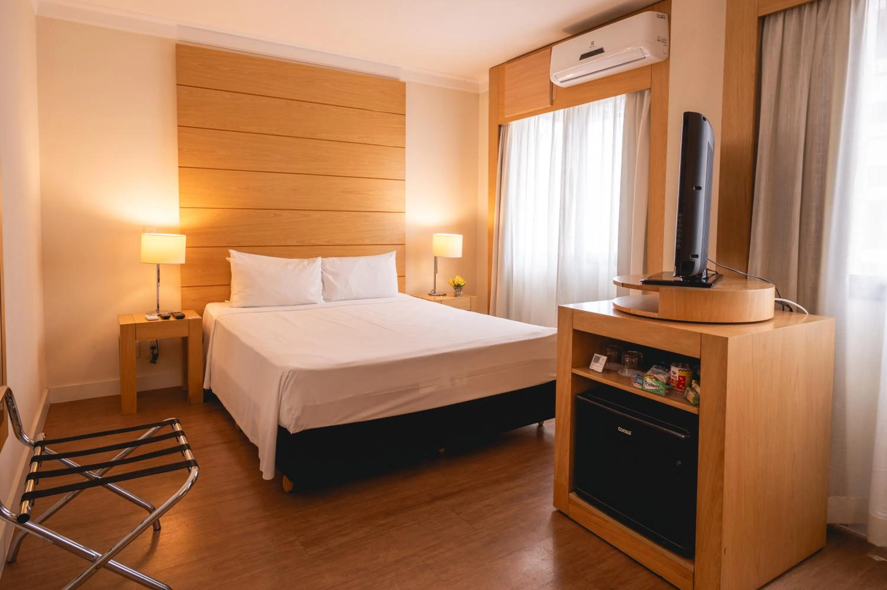 Bed in eSuítes Congonhas by Atlantica