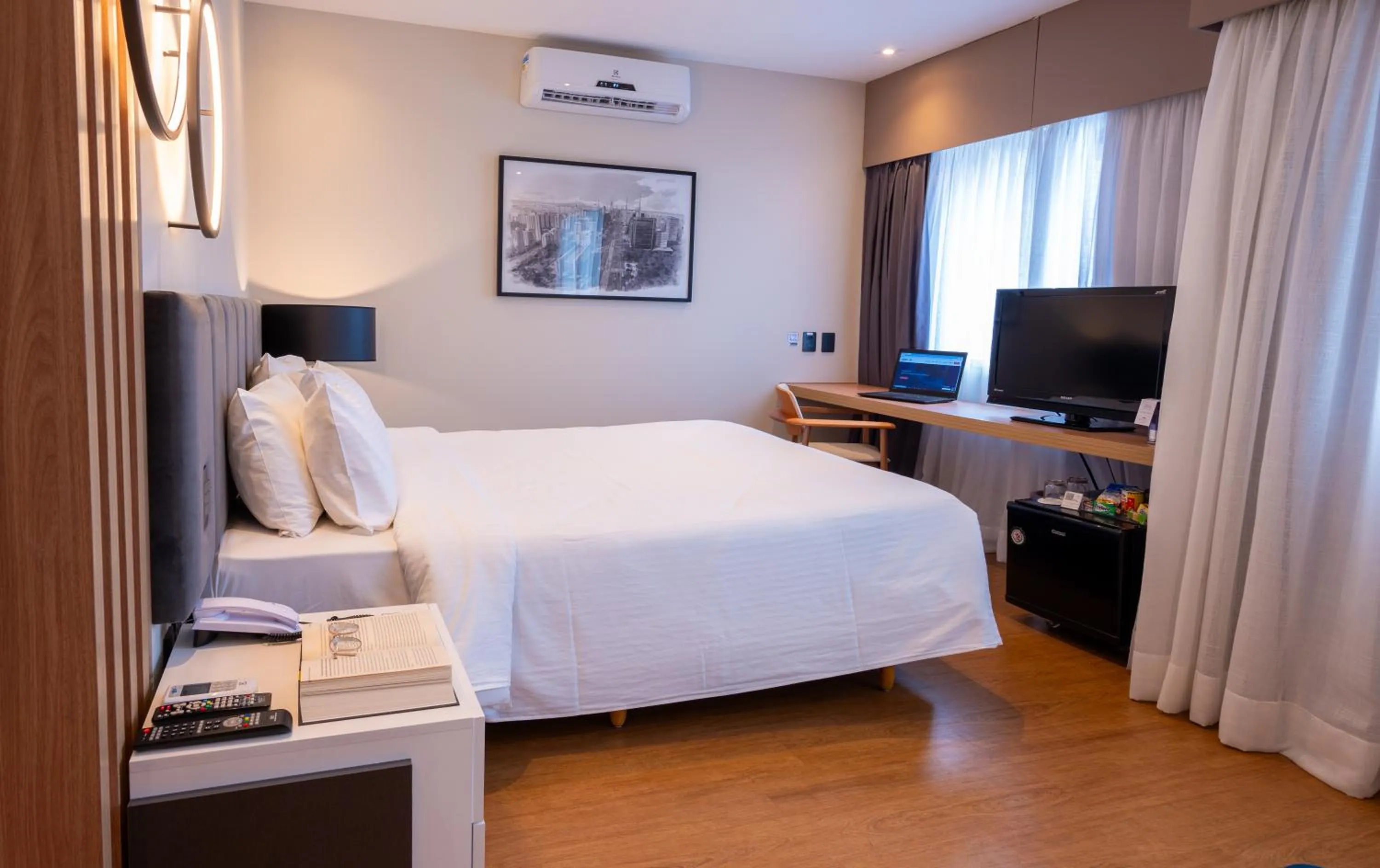 Bed in eSuítes Congonhas by Atlantica