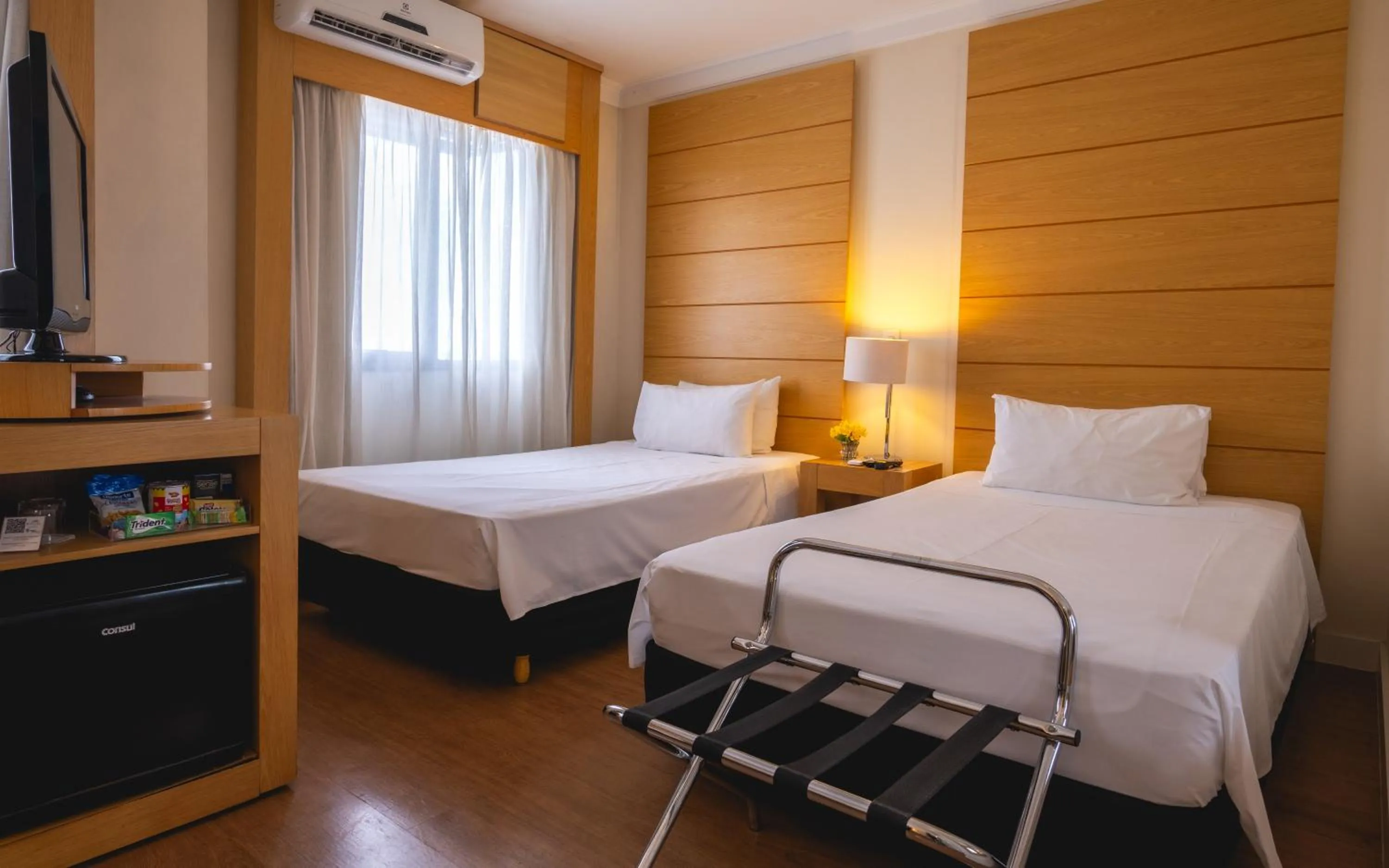 Bed in eSuítes Congonhas by Atlantica