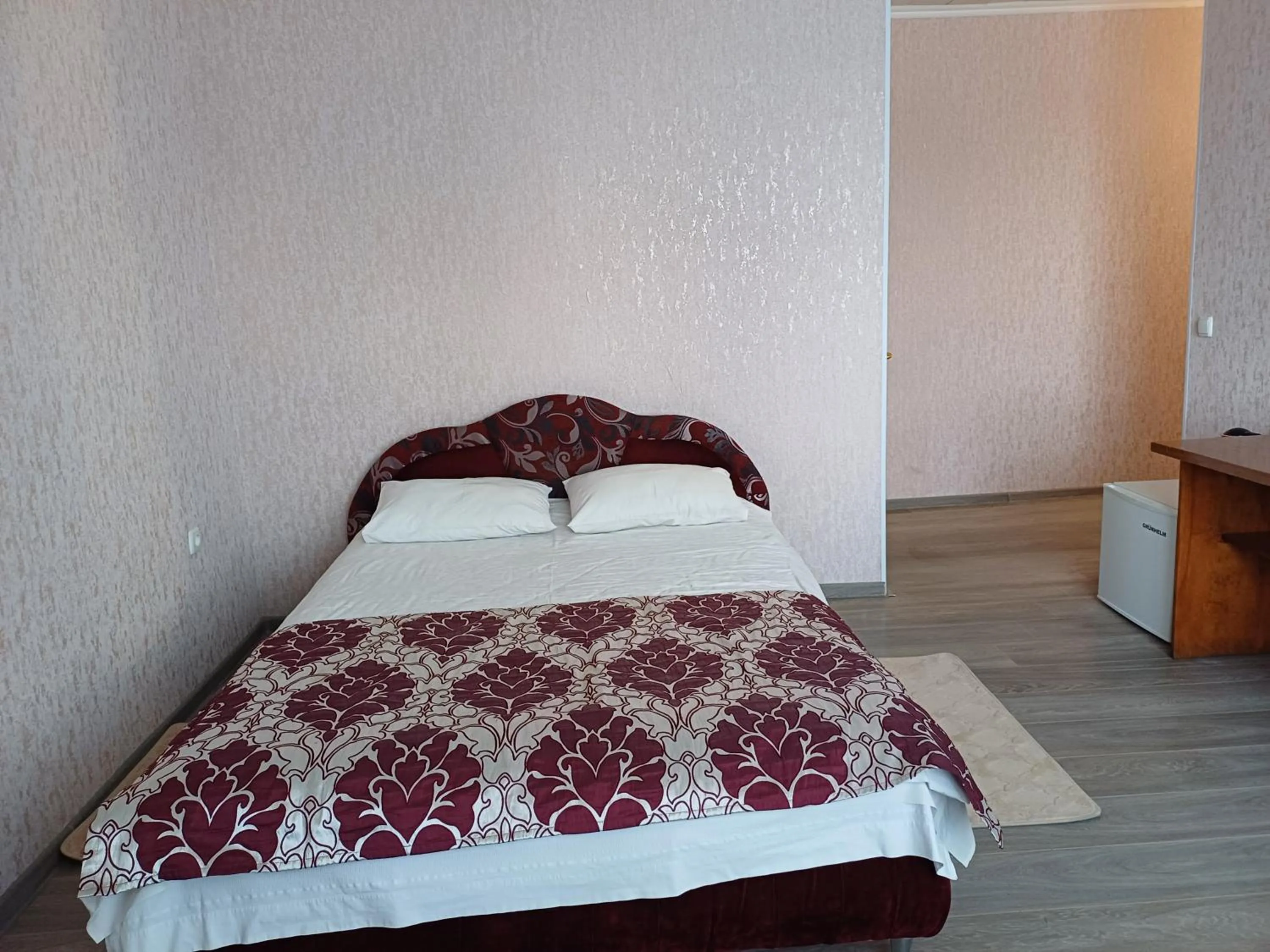 Bed in Hotel Gostynnyi Dvir