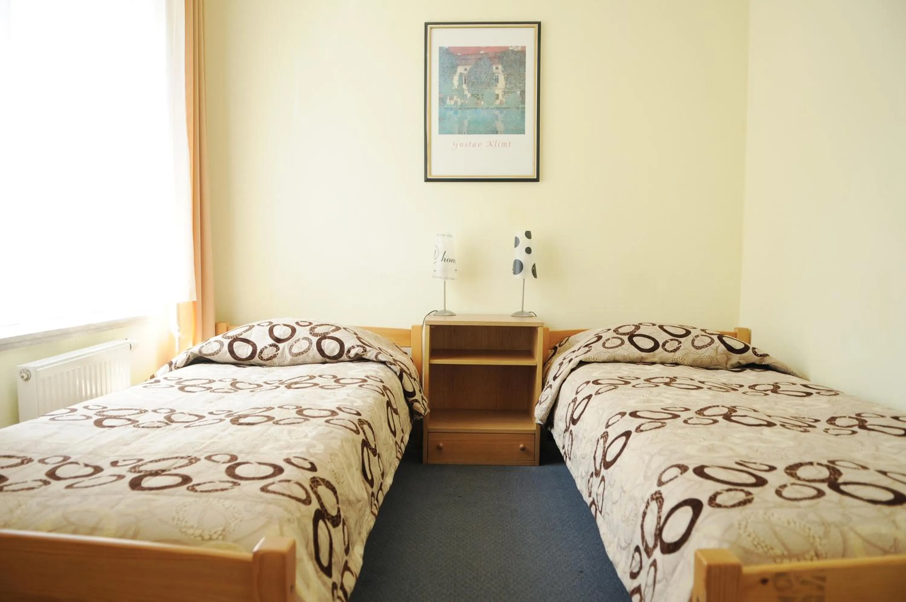 Living room, Bed in Amicus Hotel