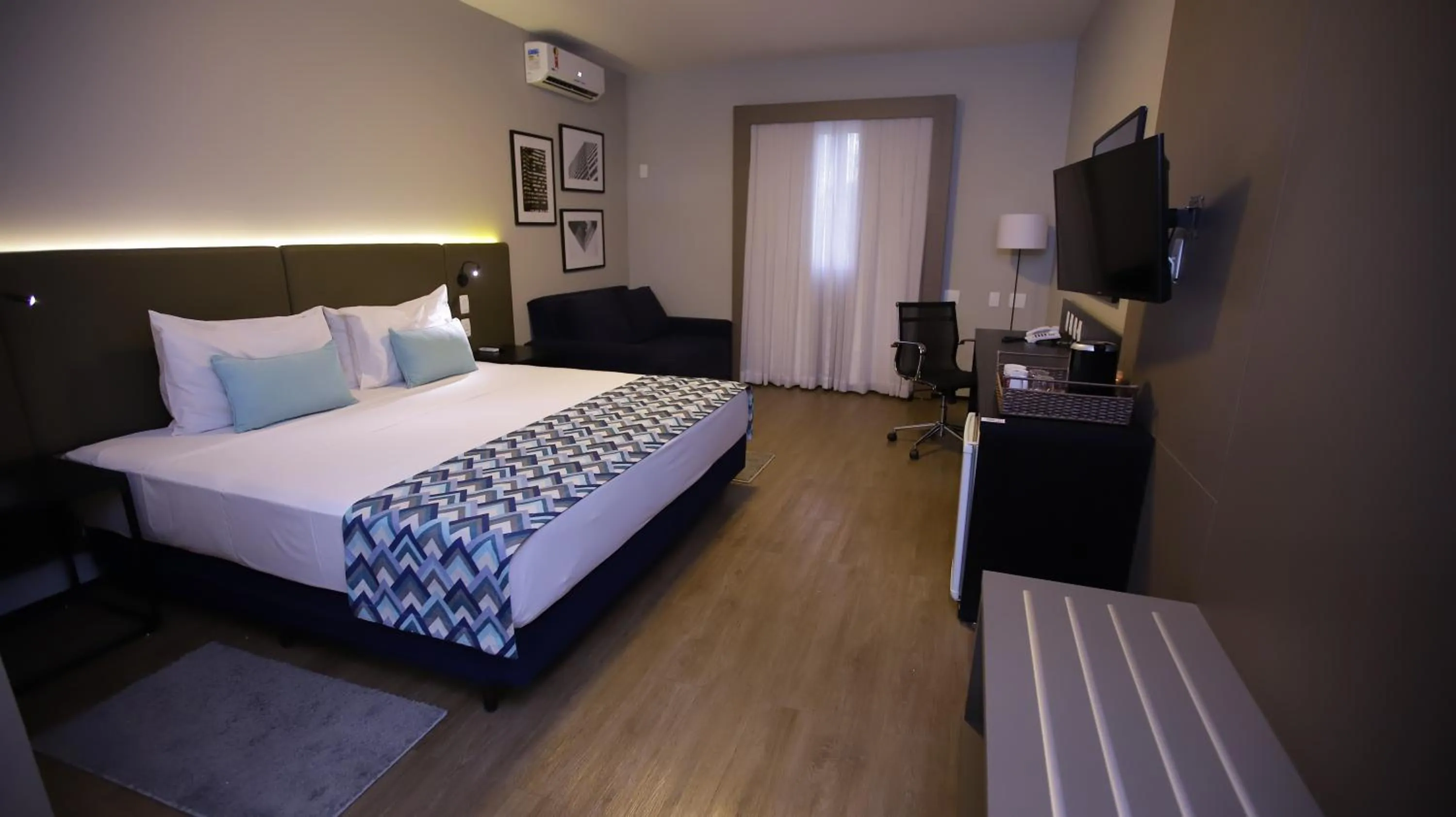 Bed in Comfort Suites Flamboyant Goiânia