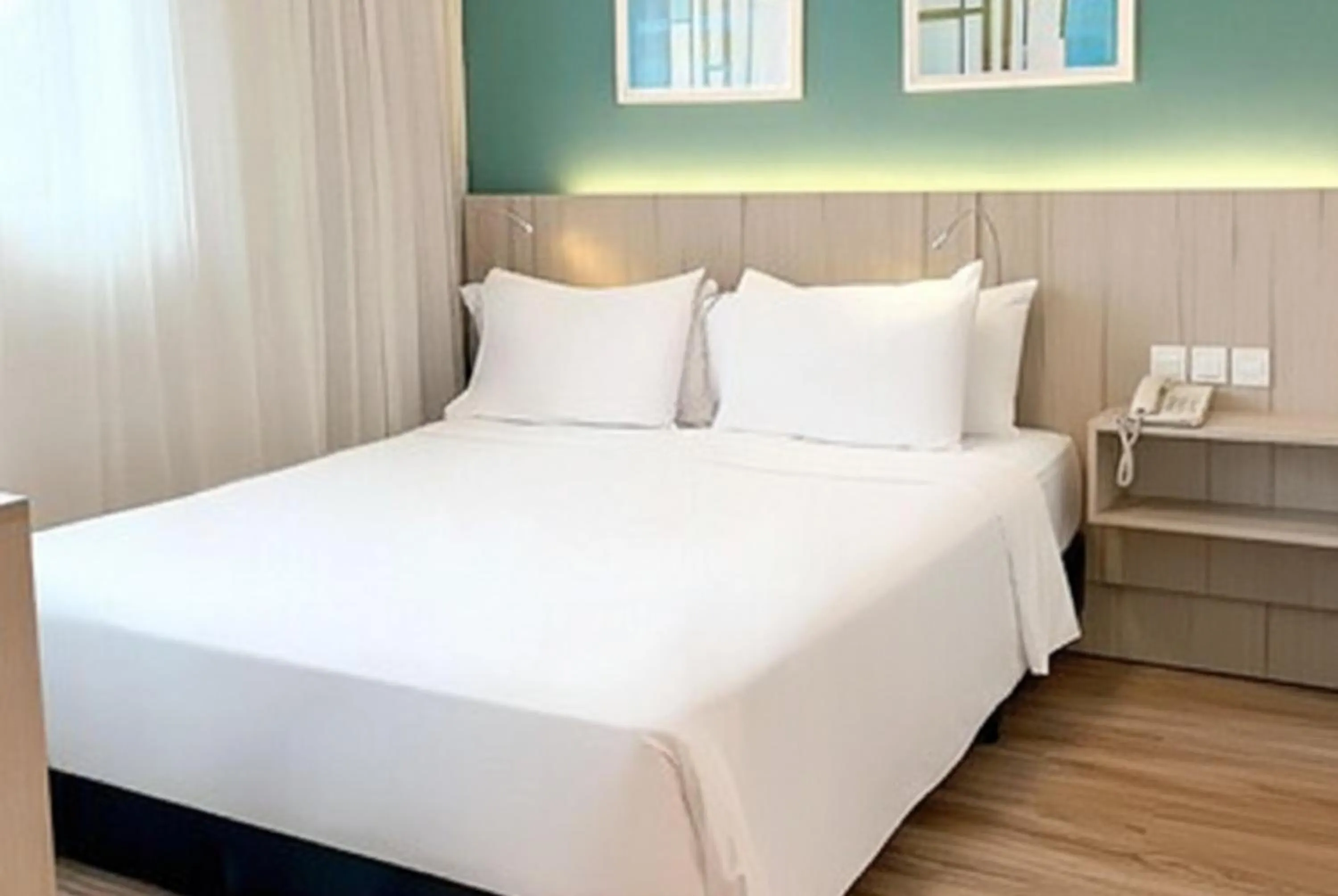 Bed in Radisson Oscar Freire