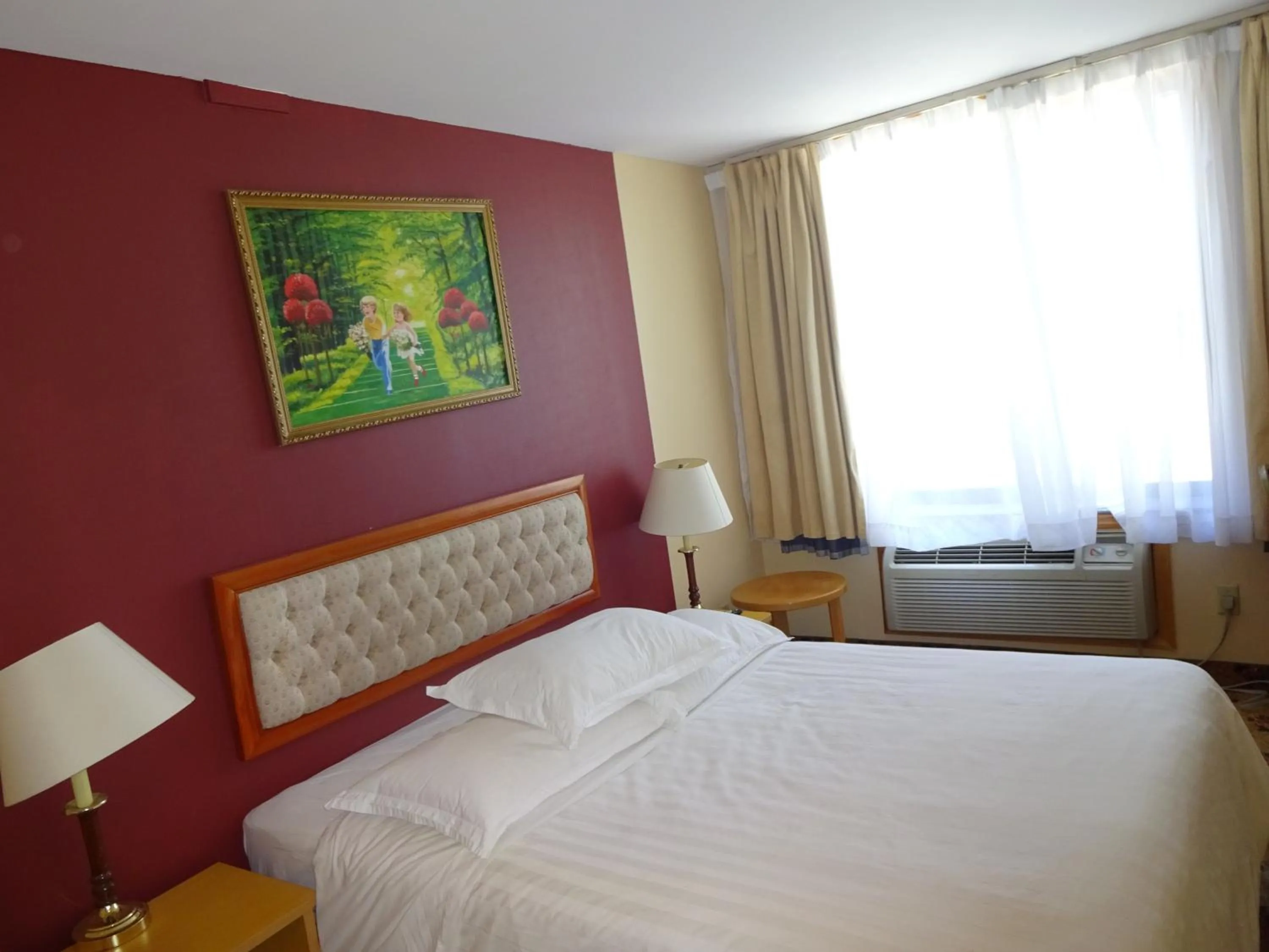 Bed in Flushing Hotel