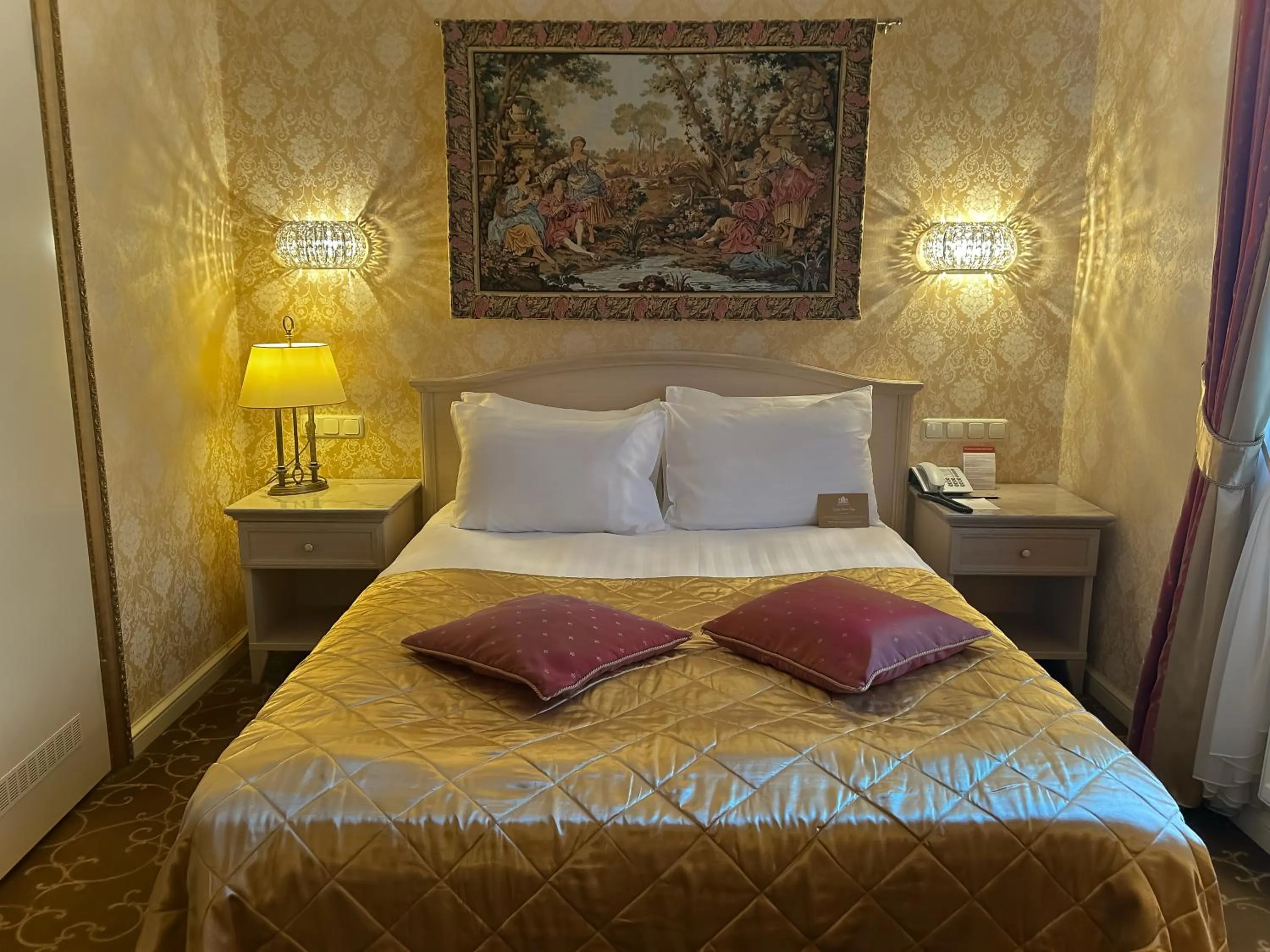 Bed in Imperial Hotel & Restaurant