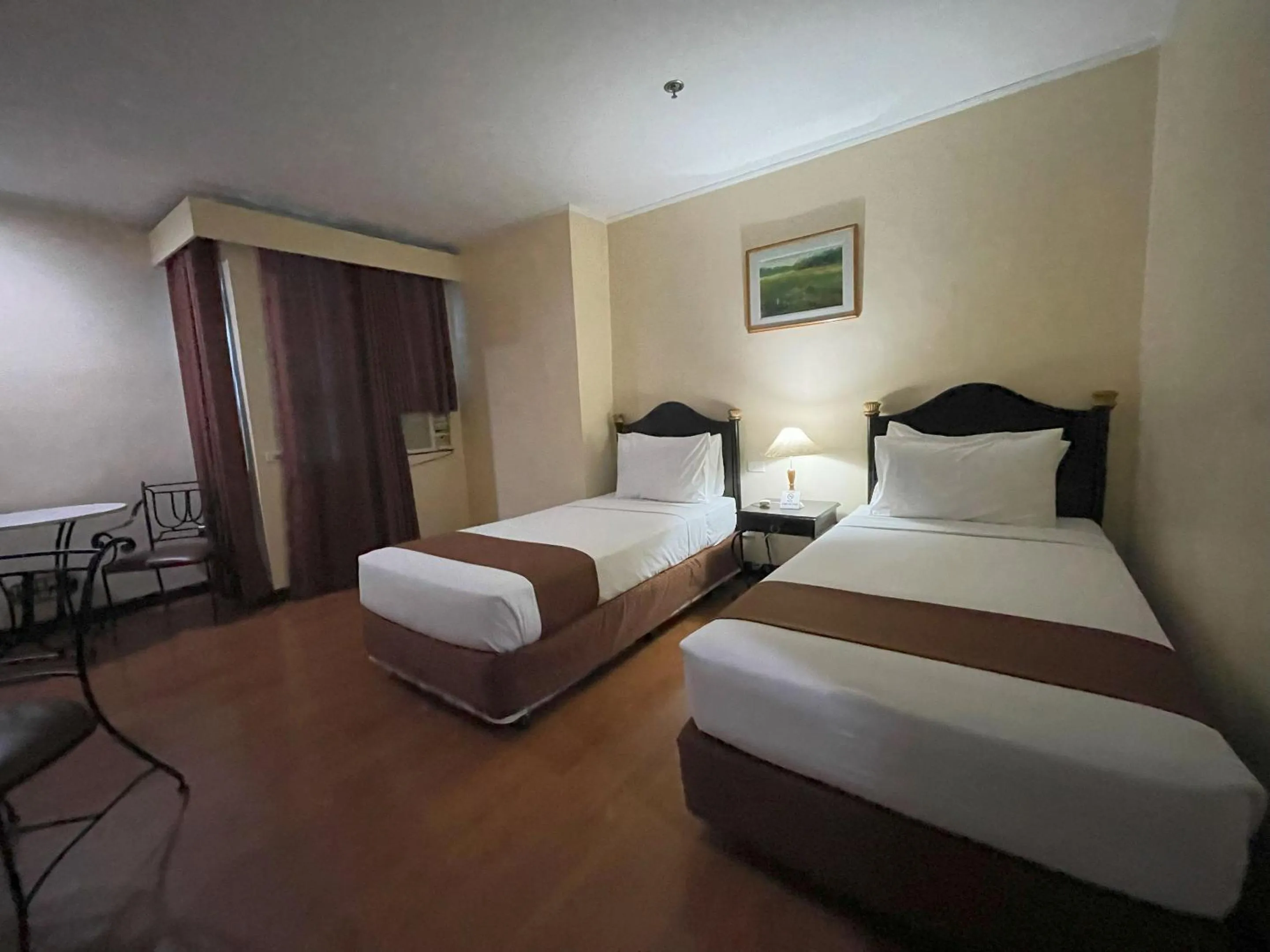 Bed in Golden Peak Hotel & Suites powered by Cocotel