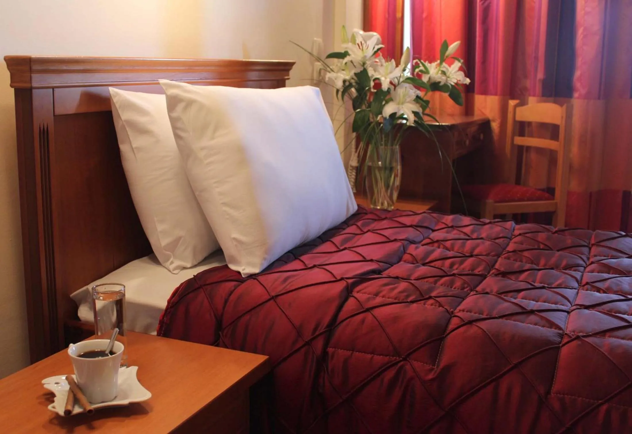 Bed in Famissi Eden Hotel