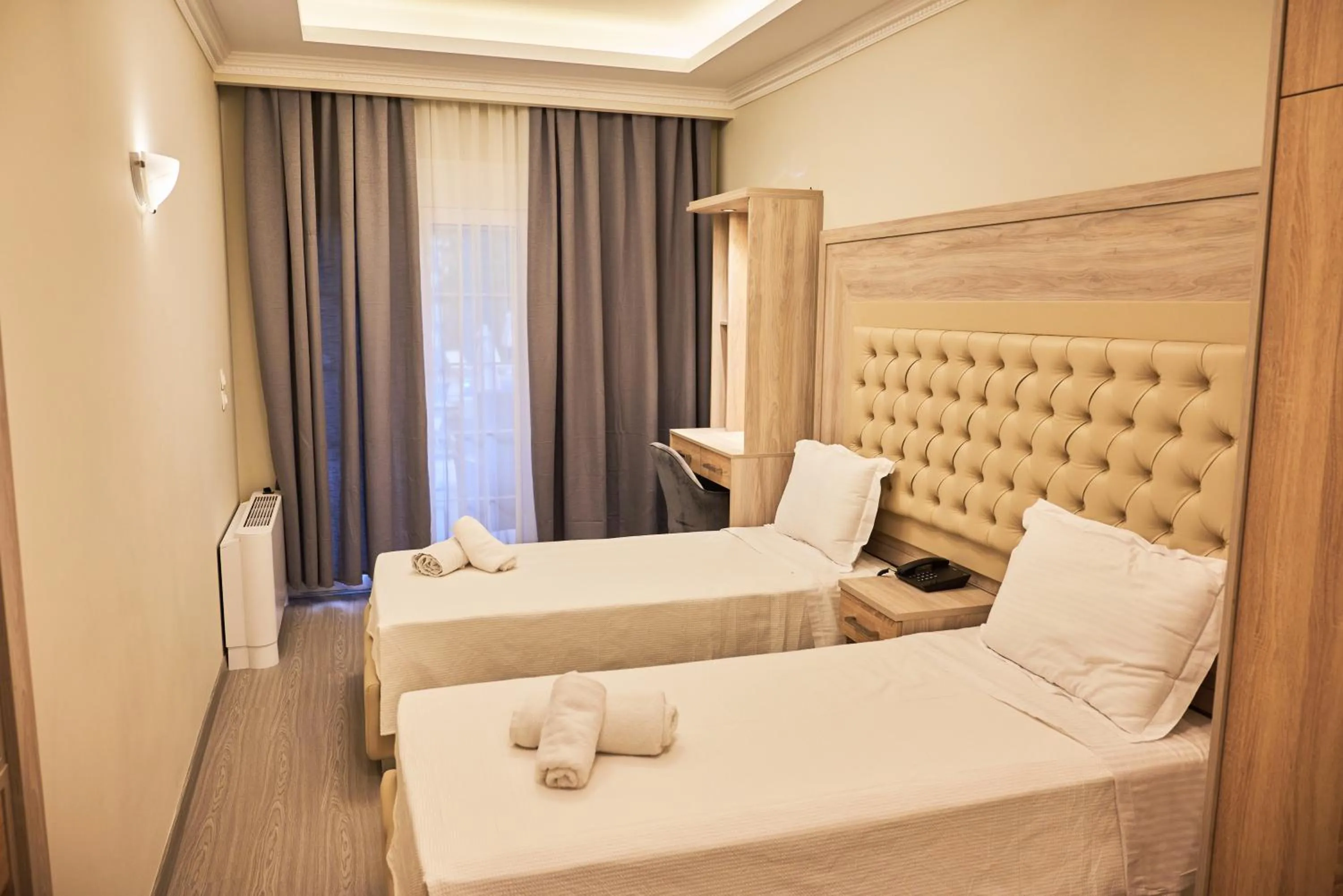 Bed in Famissi Eden Hotel