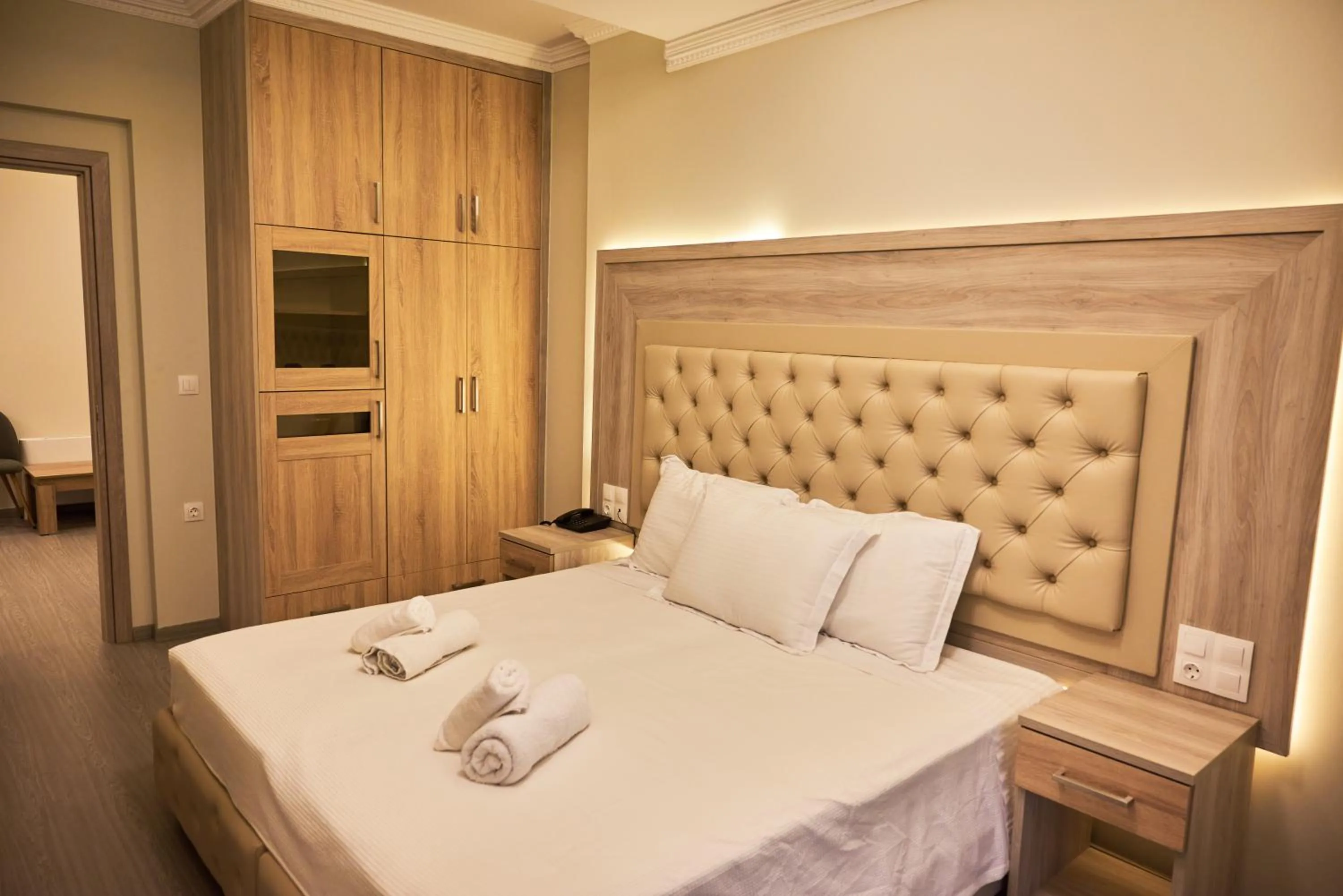 Bed in Famissi Eden Hotel