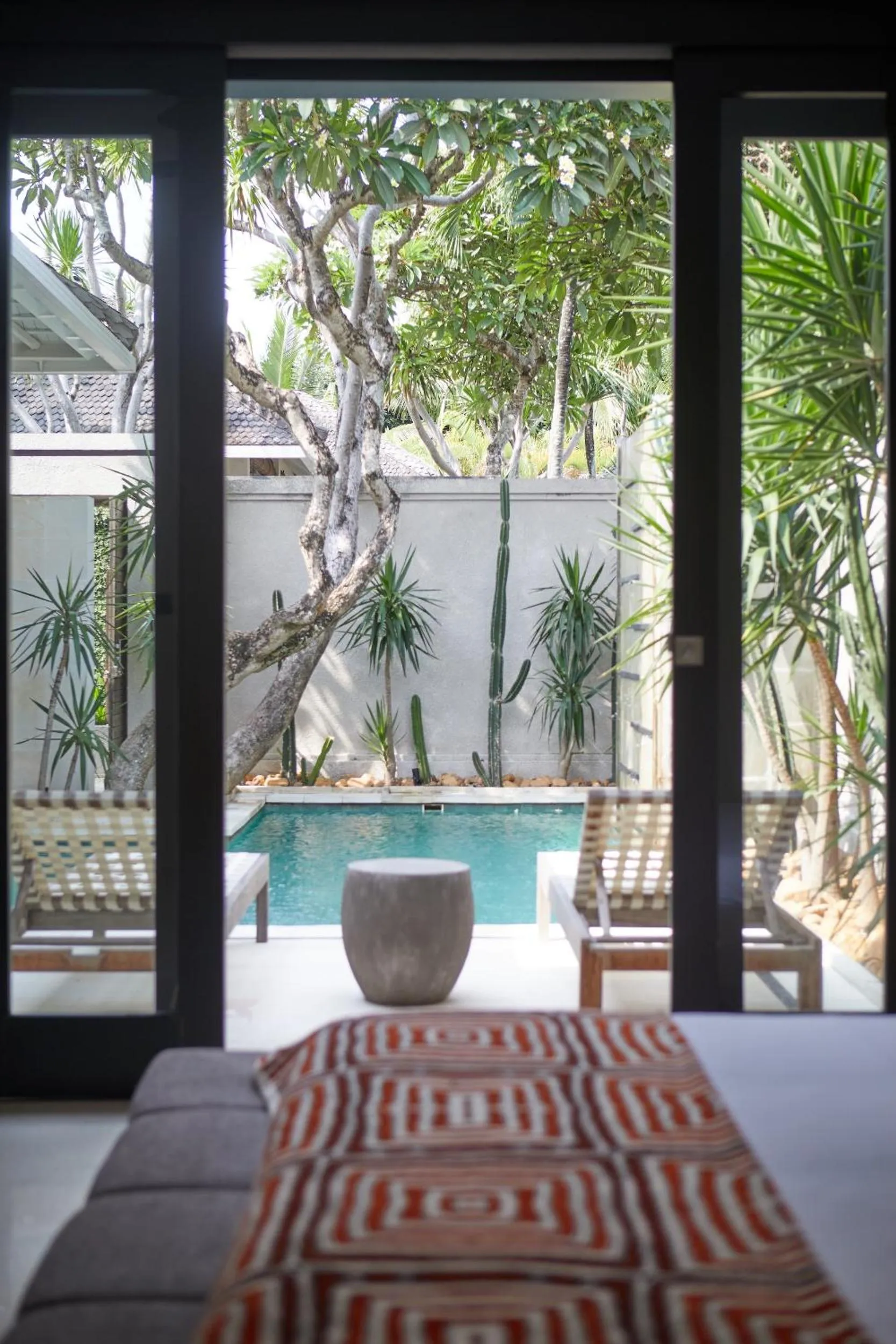 Pool view, Bed in Ahimsa Beach