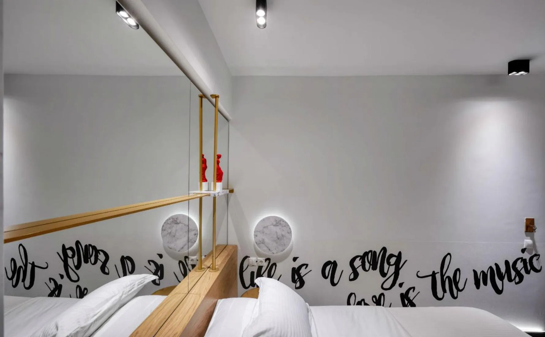 Decorative detail, Bed in Thomais Boutique Hotel