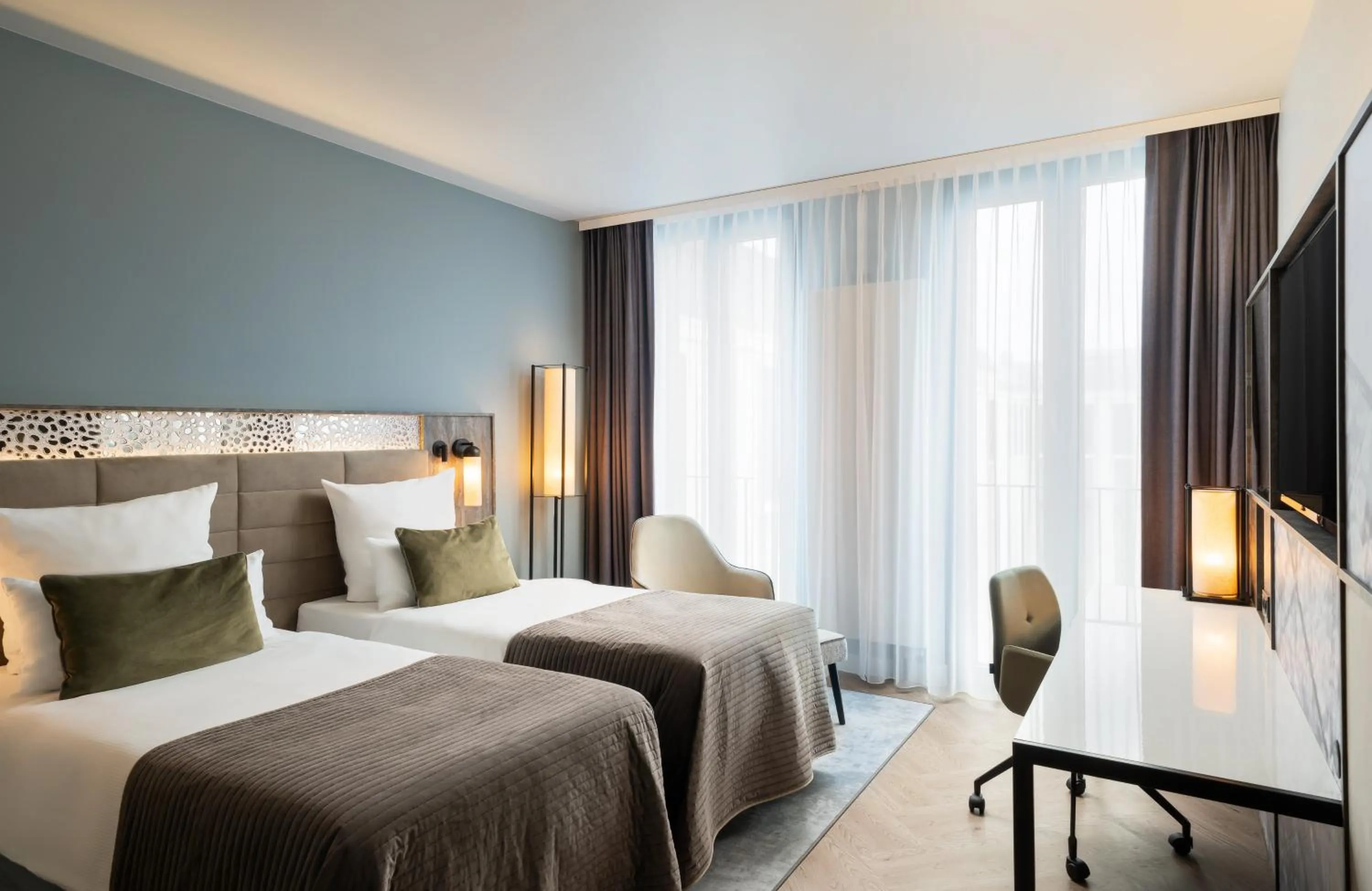 Photo of the whole room, Bed in Leonardo Royal Hotel Munich