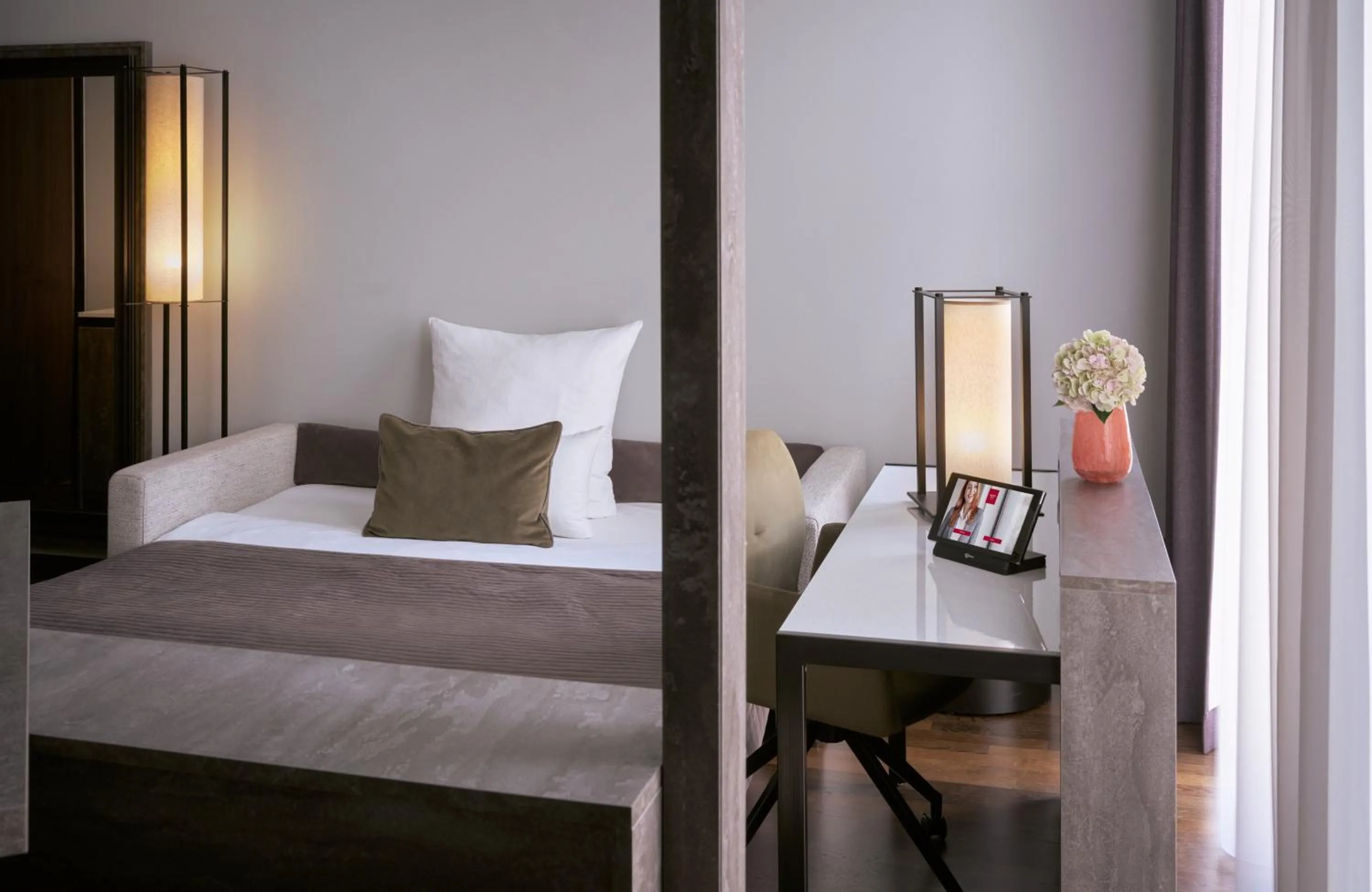 Photo of the whole room, Bed in Leonardo Royal Hotel Munich