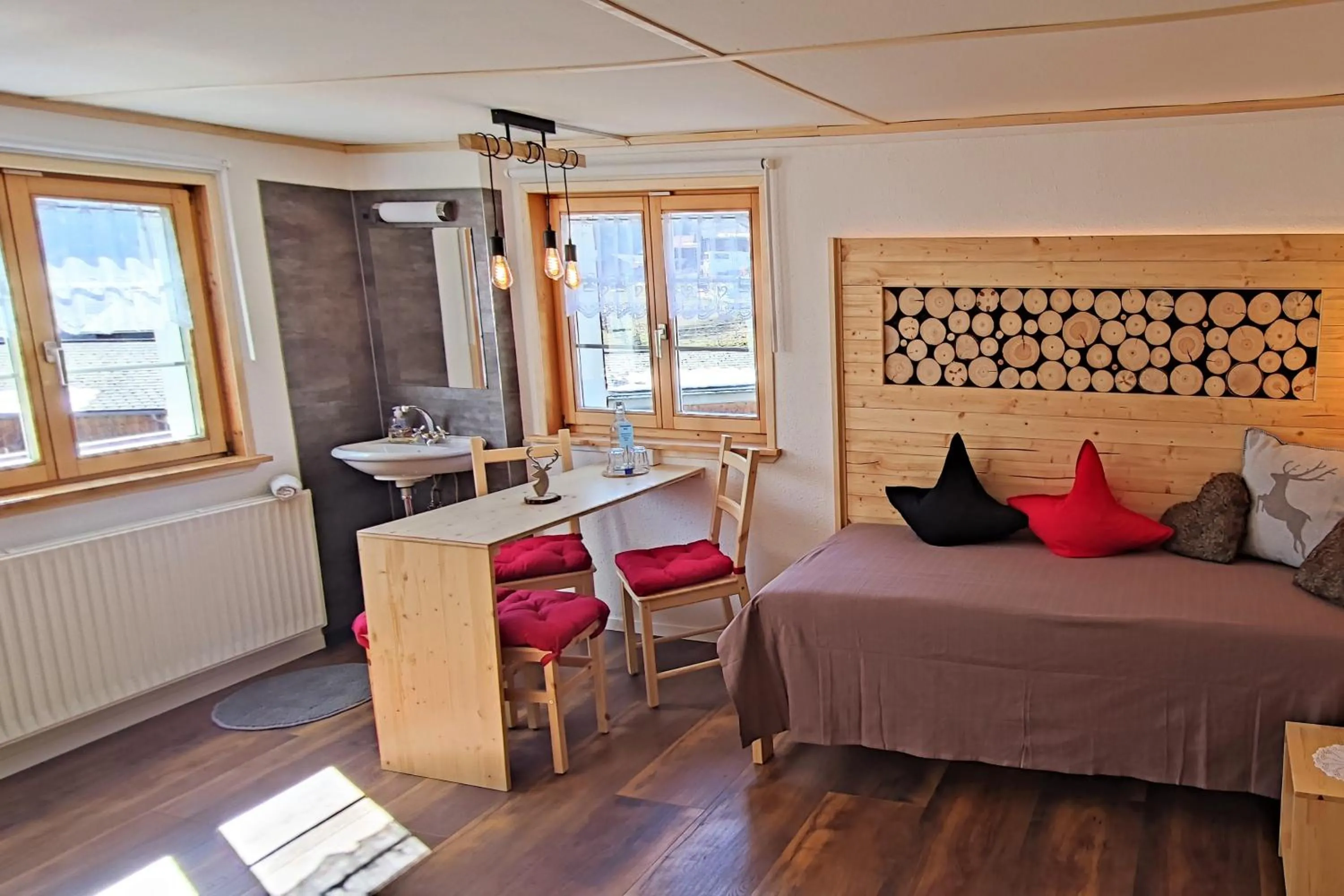 Photo of the whole room in Gasthaus Alpina