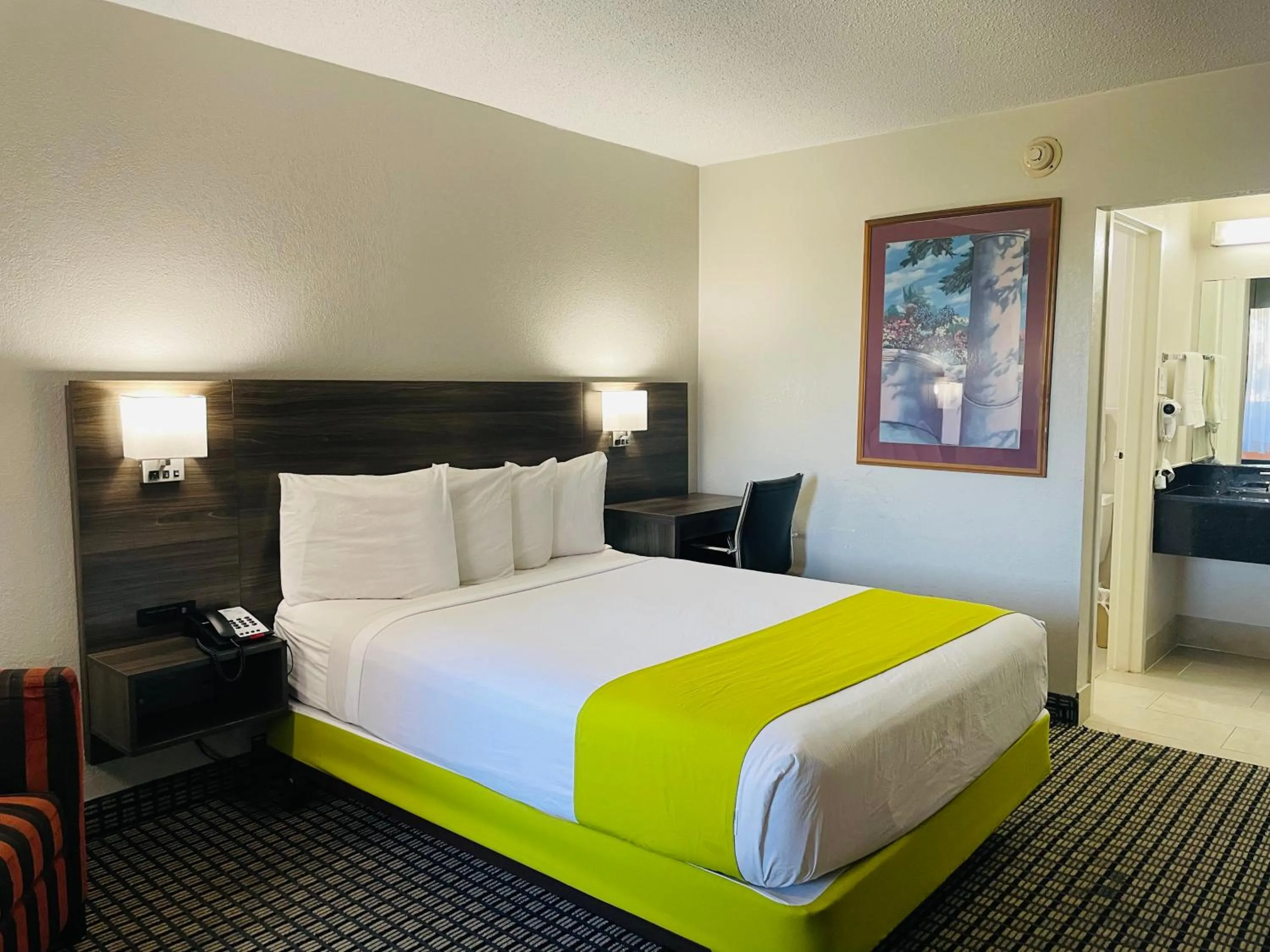 Bed in Days Inn by Wyndham Irving Grapevine DFW Airport North