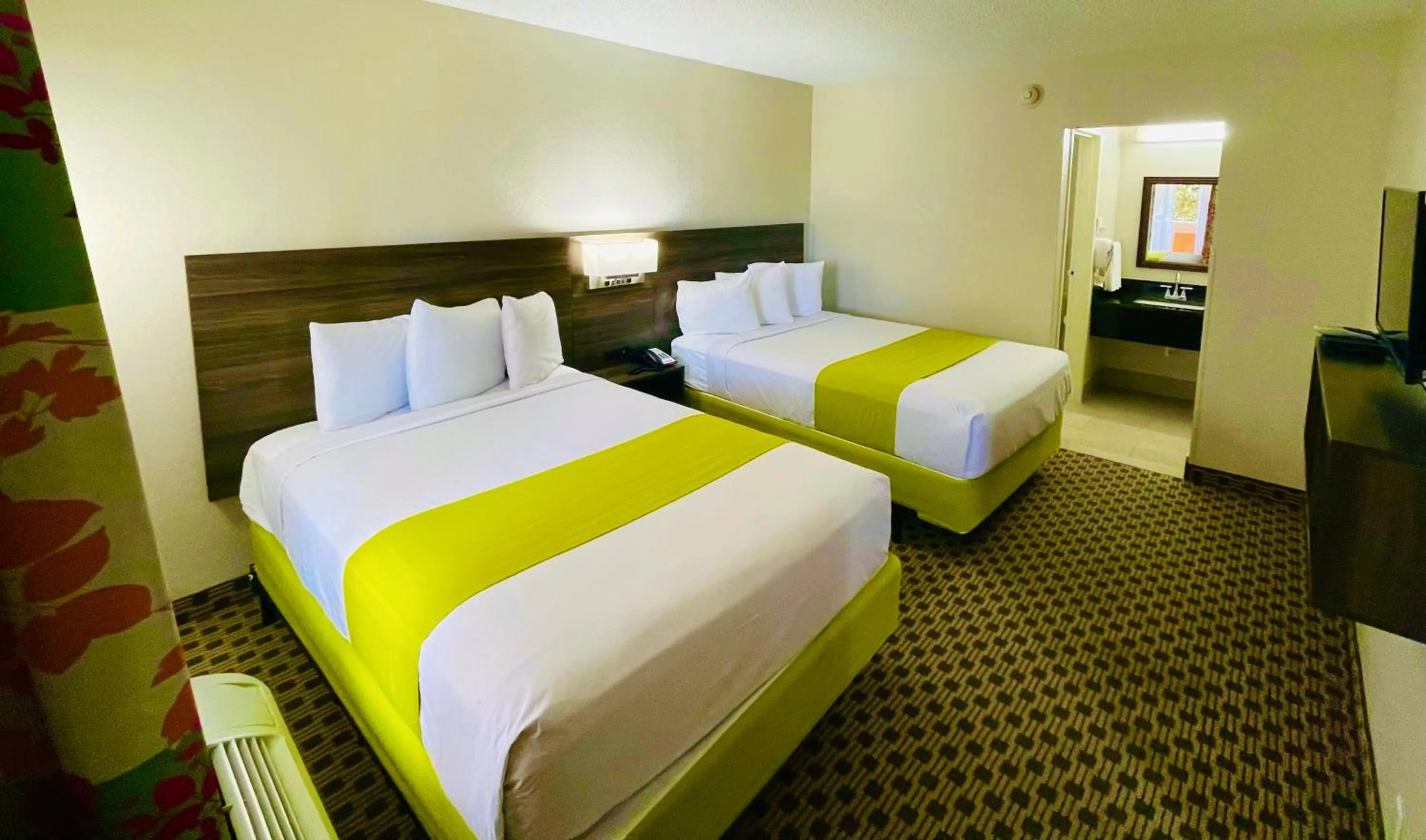 Bed in Days Inn by Wyndham Irving Grapevine DFW Airport North