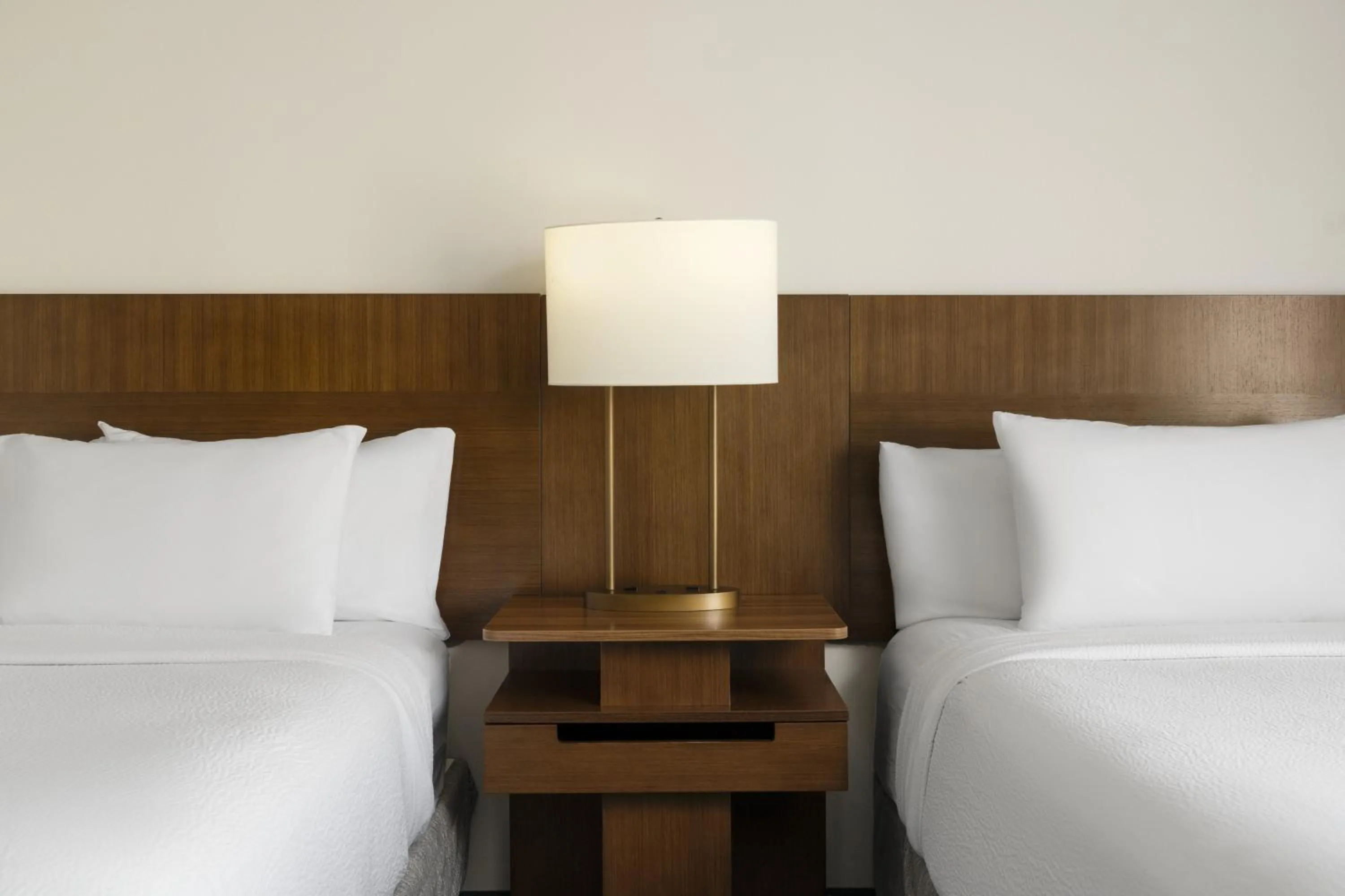 Bed in Fairfield Inn & Suites by Marriott Newark Liberty International Airport