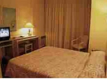 Photo of the whole room, Bed in Le Central