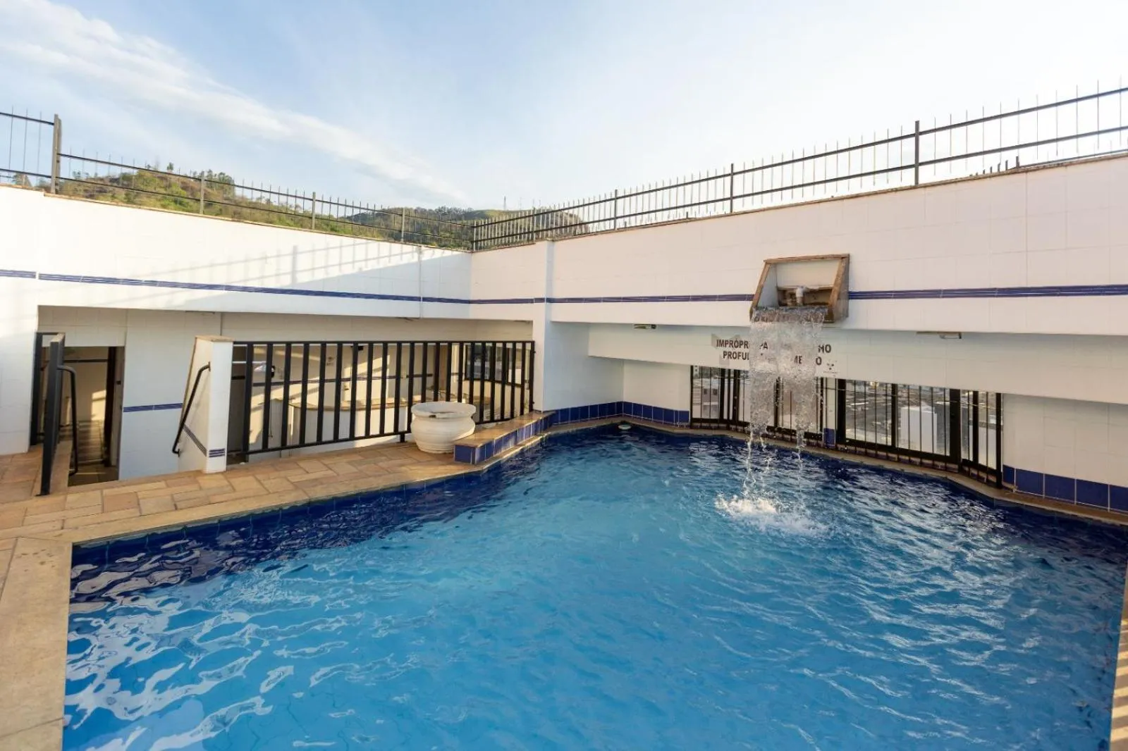 Swimming pool in Hotel Minas Tower Leopoldina By Samba