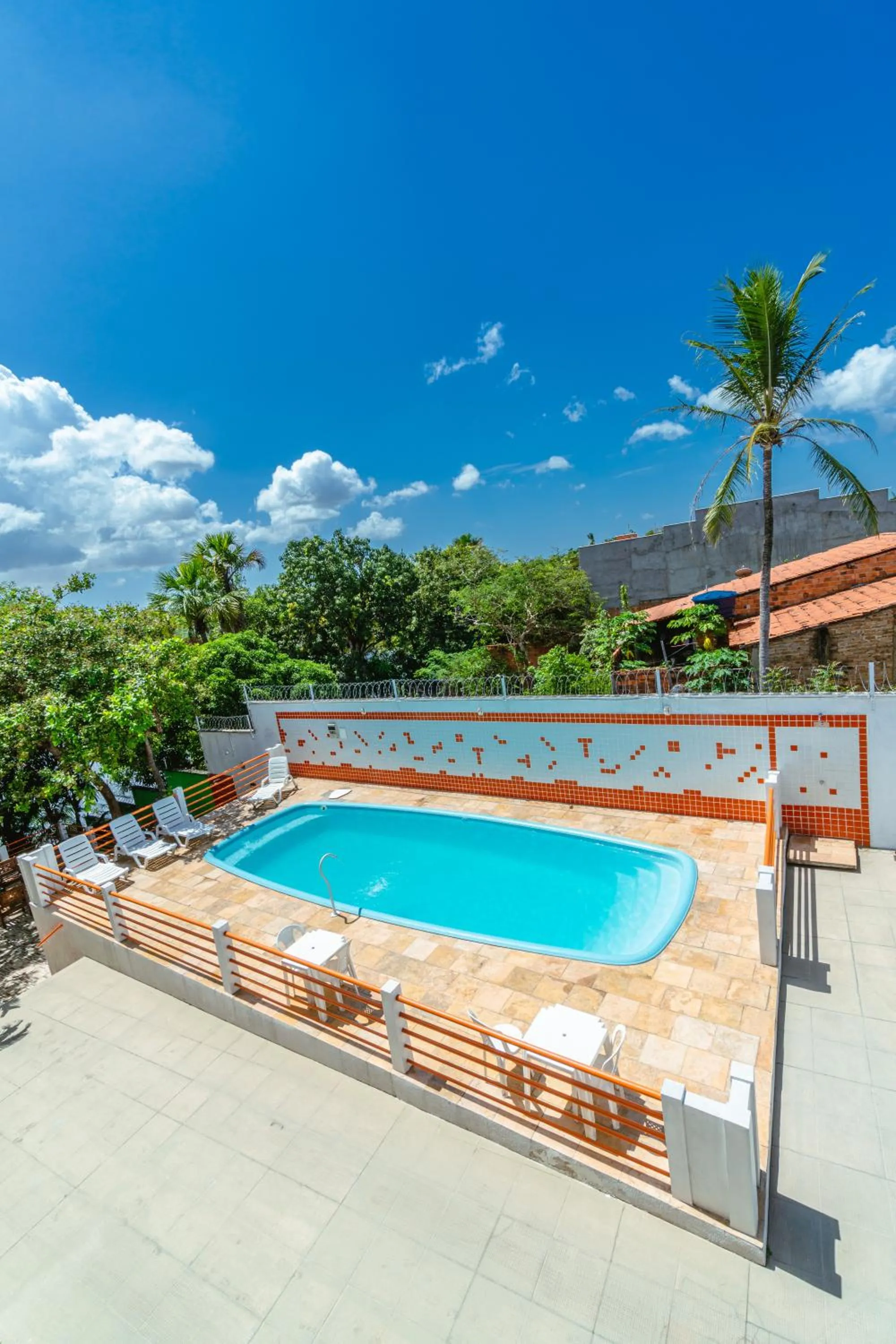 Swimming pool in Pousada Clube Vista do Rio