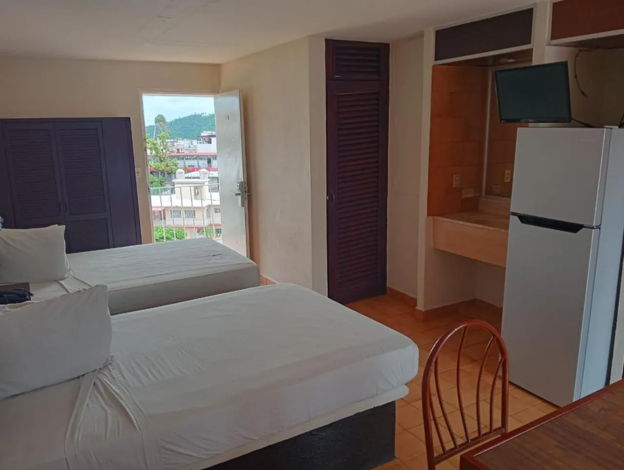 Property building, Bed in Alba Suites Acapulco
