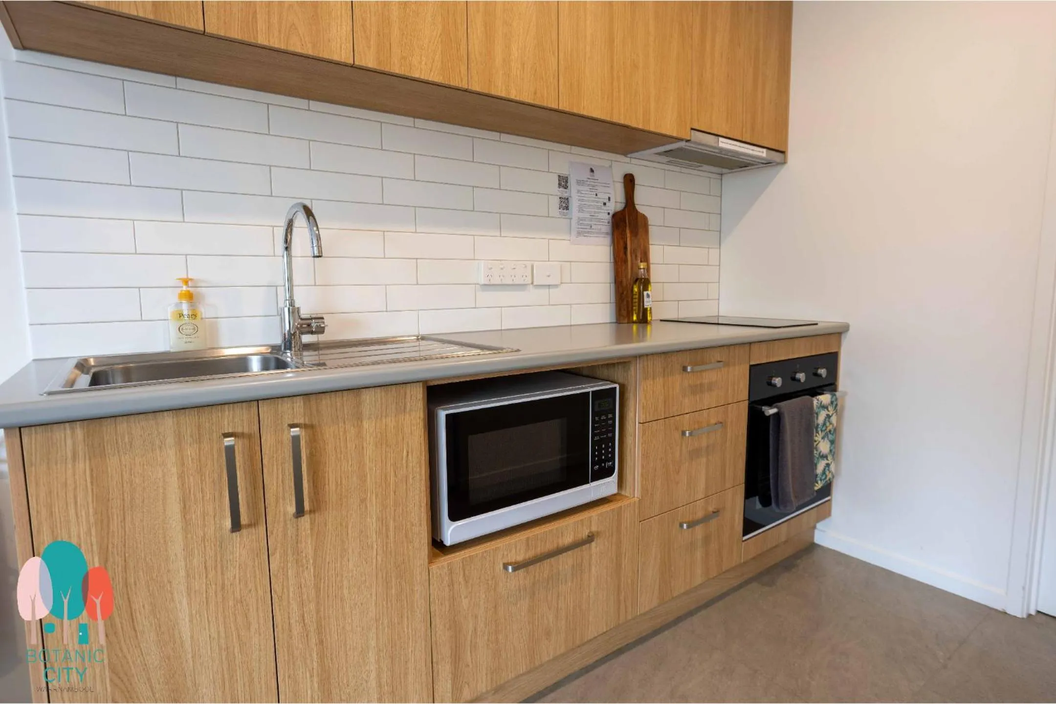 Kitchen or kitchenette in Botanic City Apartments
