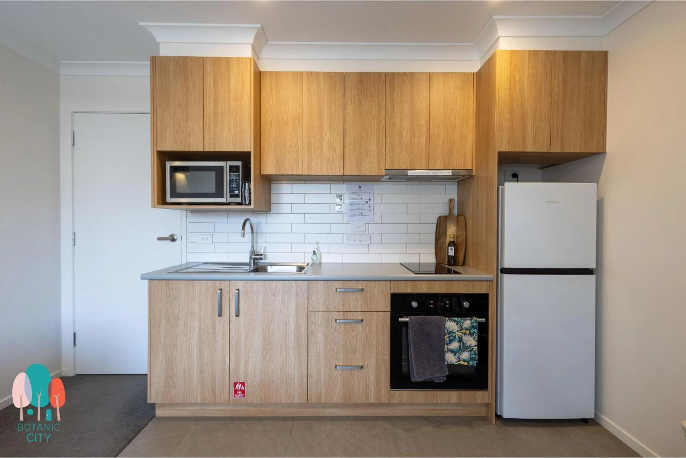 Kitchen or kitchenette in Botanic City Apartments