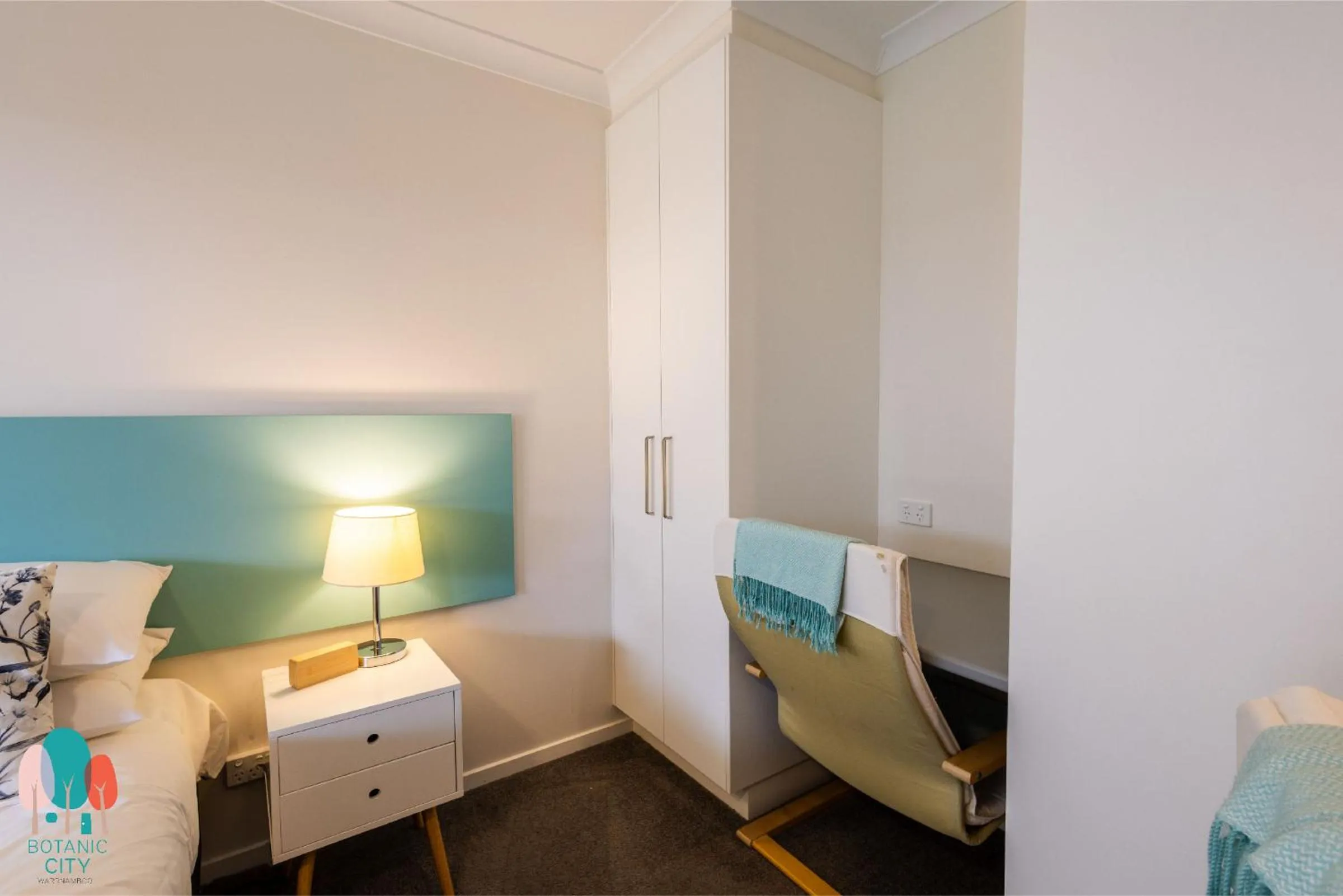 Bed in Botanic City Apartments