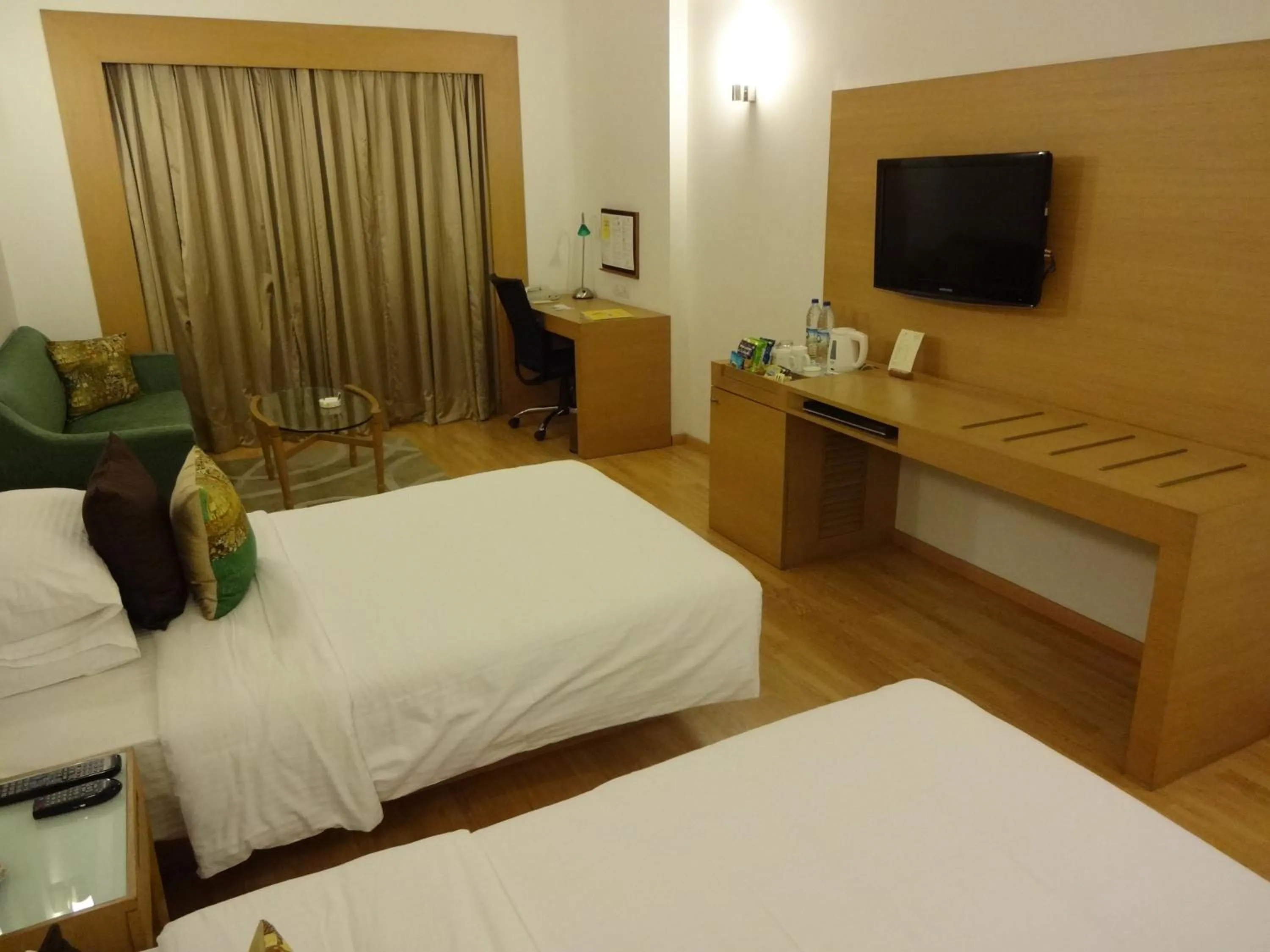 Photo of the whole room, Bed in Lemon Tree Premier Hitec City Hyderabad