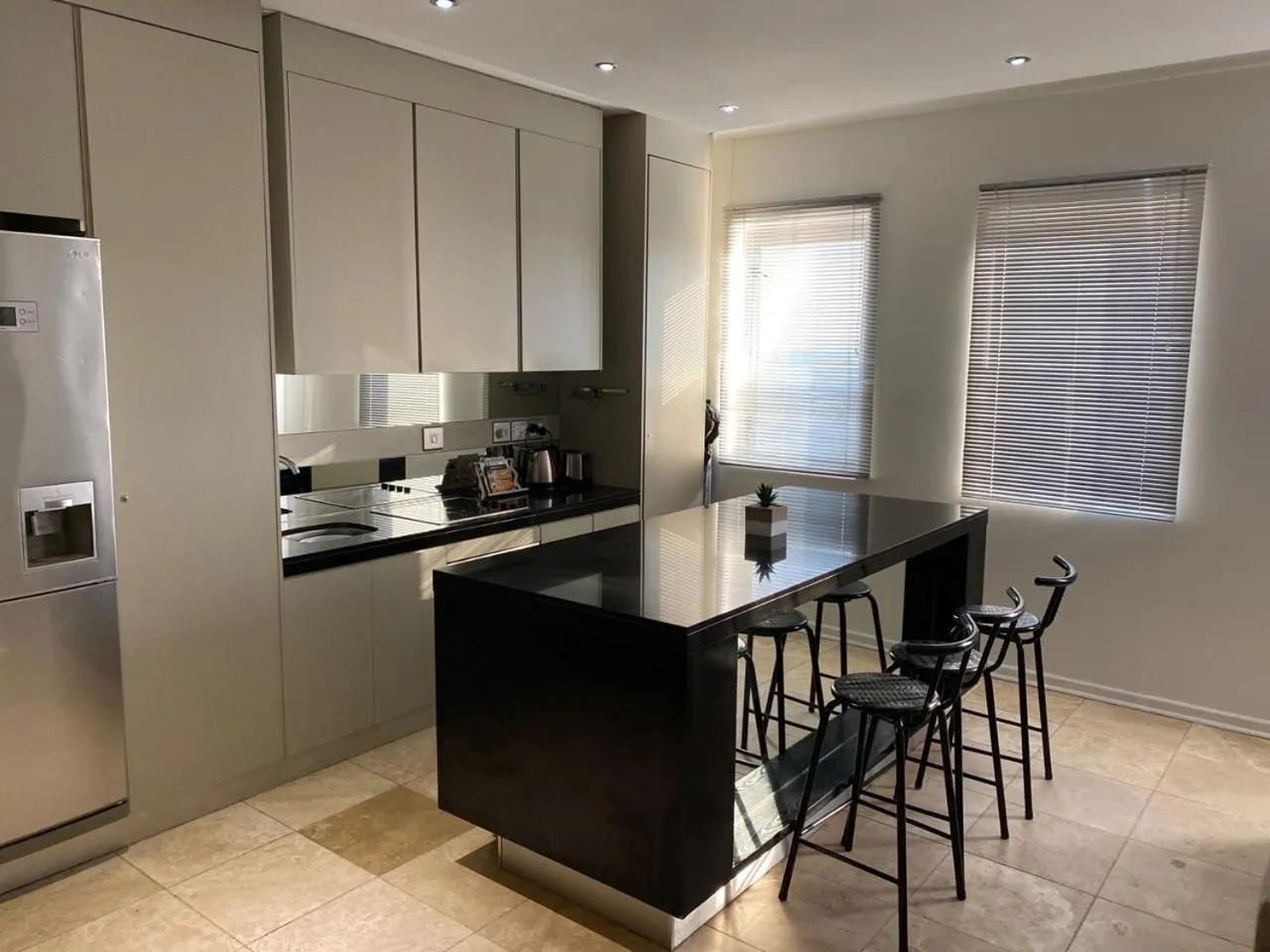 Kitchen or kitchenette in The Franklin Luxury Apartments