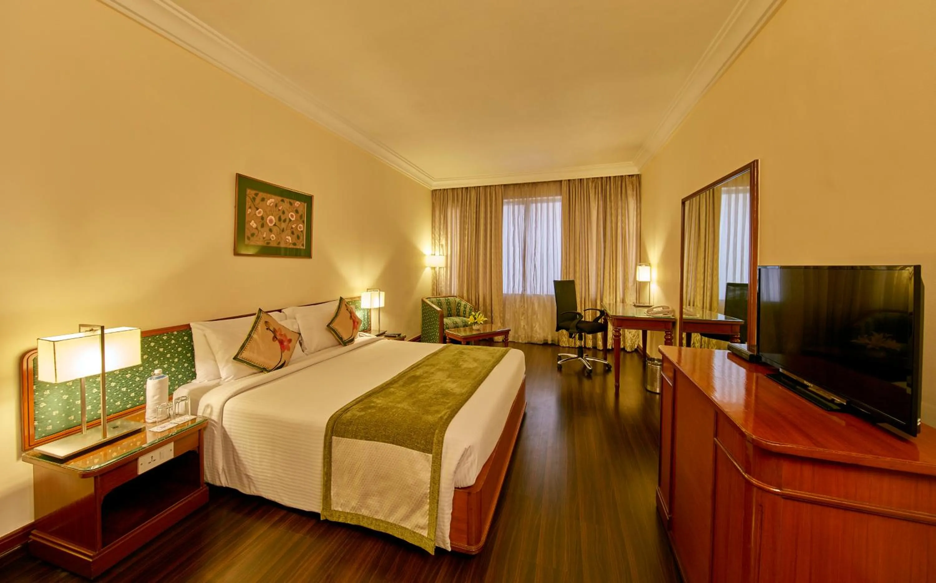 Bedroom, Bed in Royal Orchid Central Bangalore, MG Road