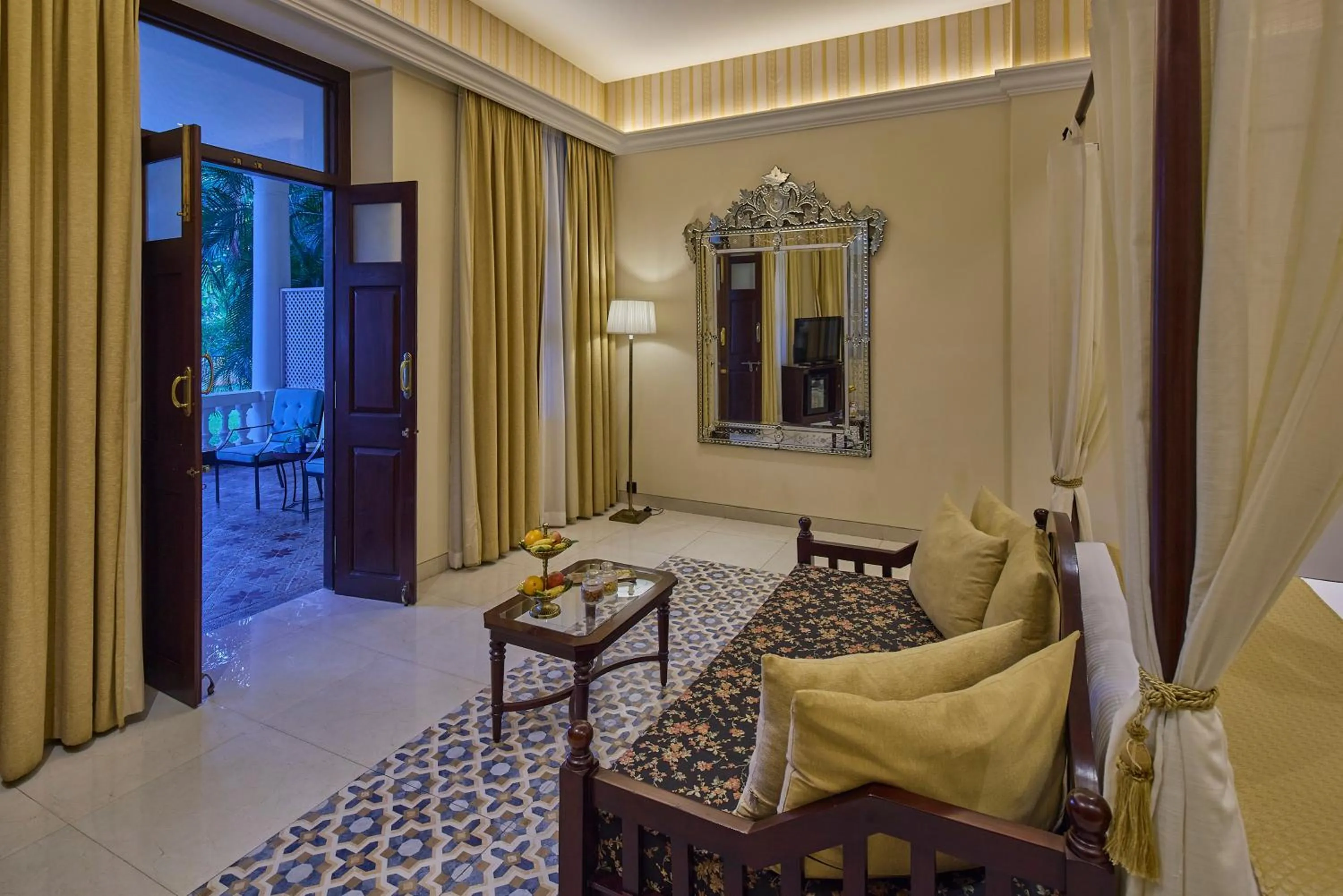 Living room, Bed in Royal Orchid Metropole Mysore