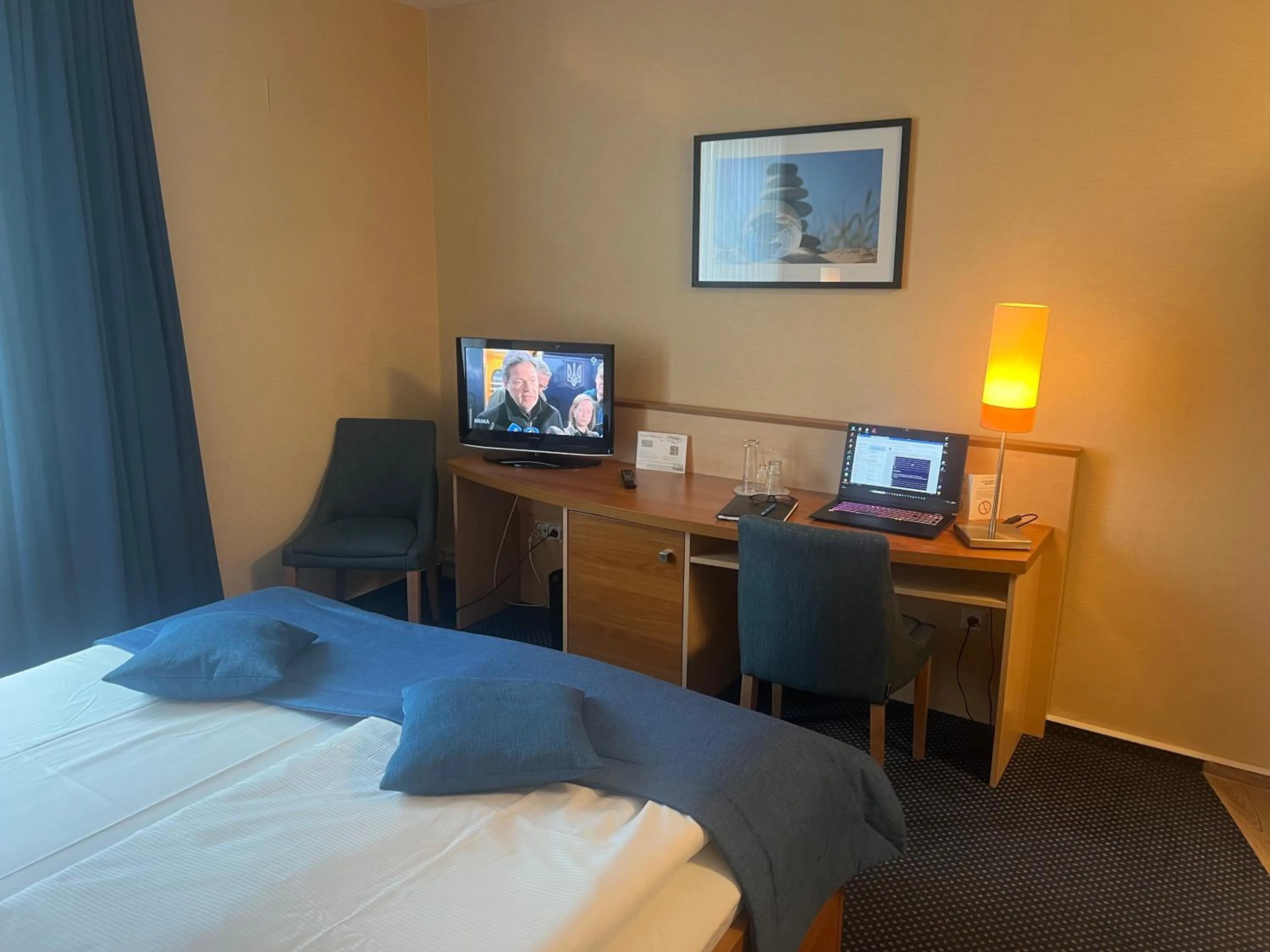 Photo of the whole room, Bed in Atrium Hotel Krüger