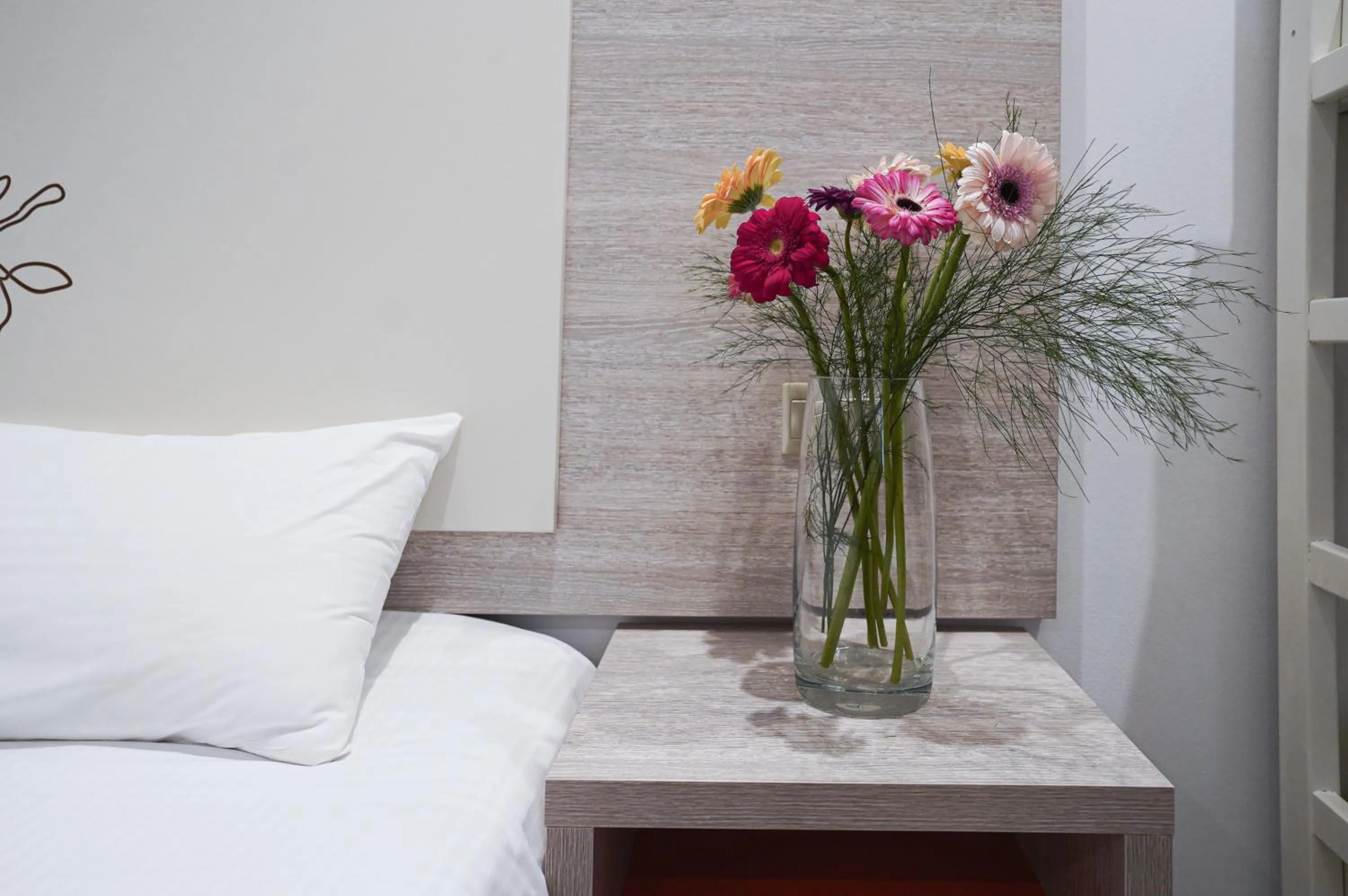 Bed in Nicholas Color Hotel