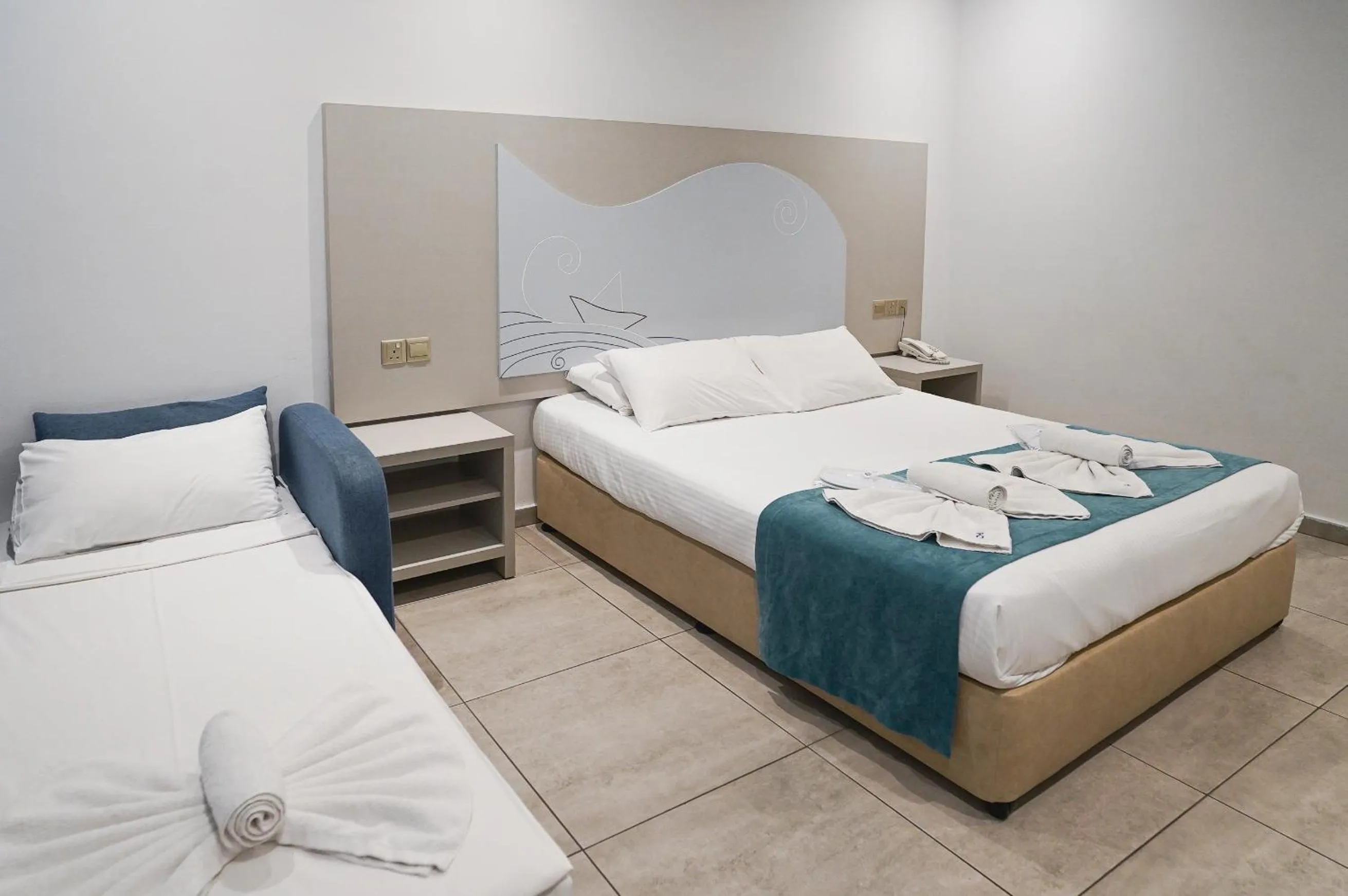 Bed in Nicholas Color Hotel