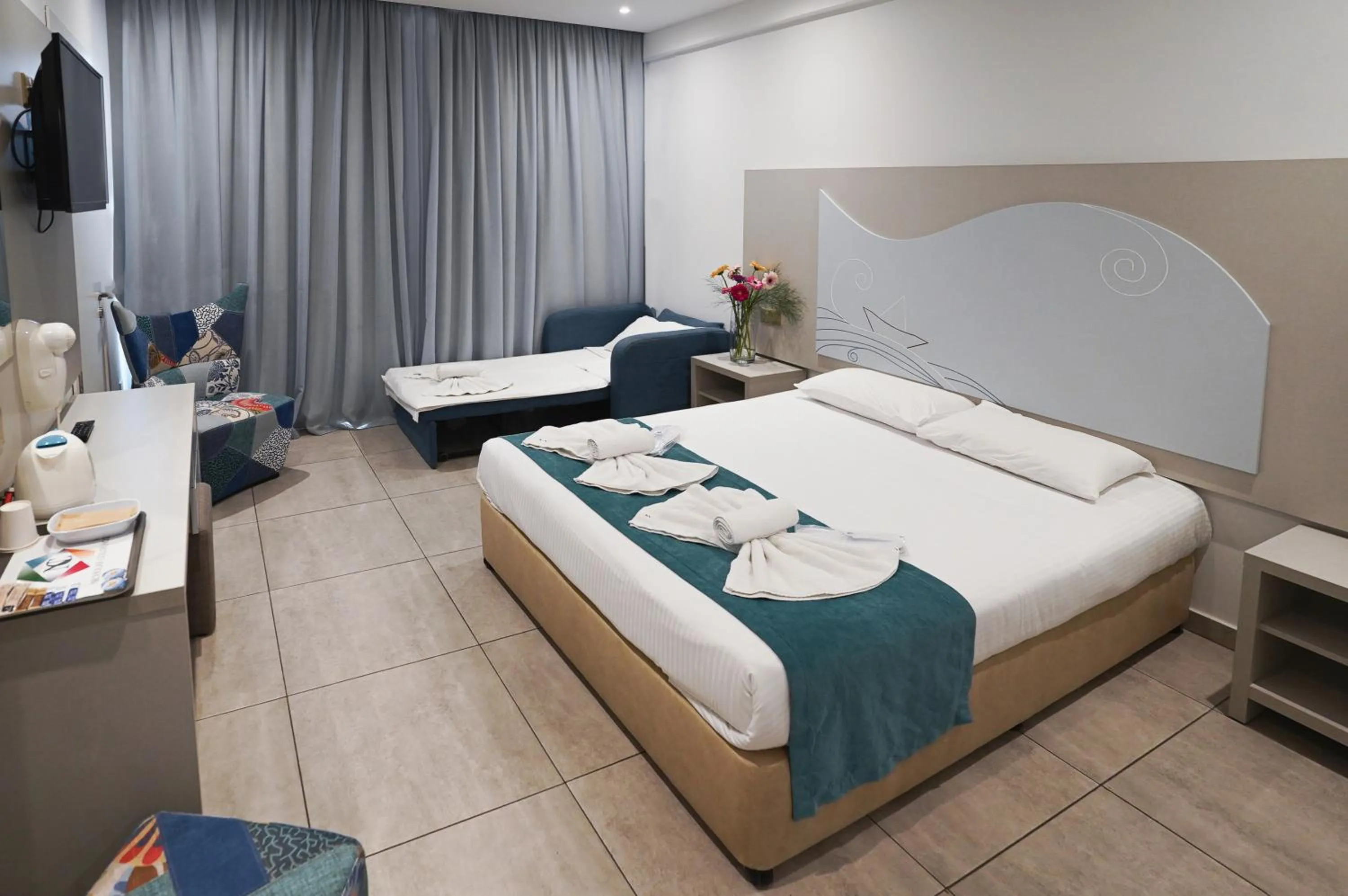 Bed in Nicholas Color Hotel