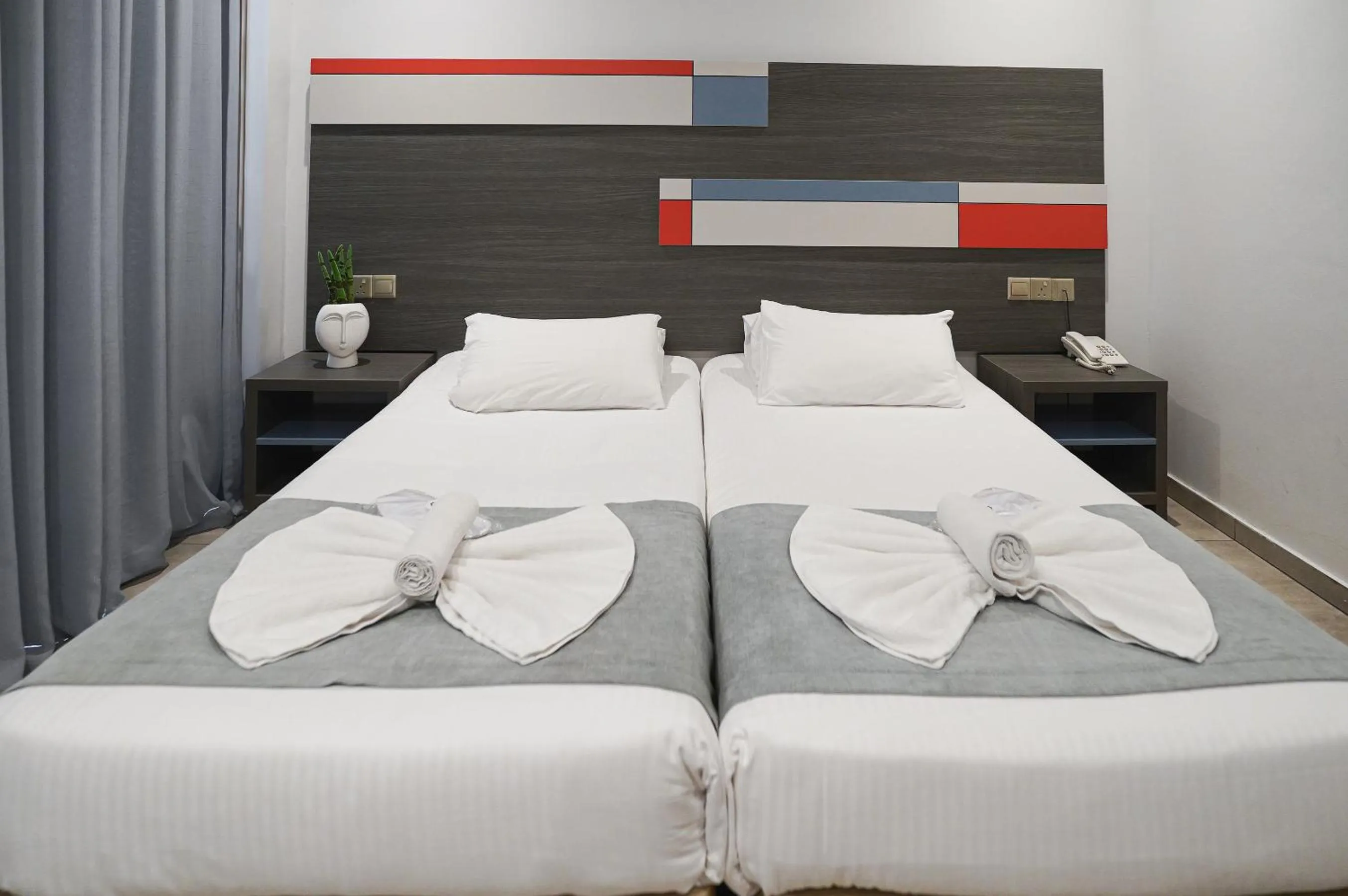 Bed in Nicholas Color Hotel