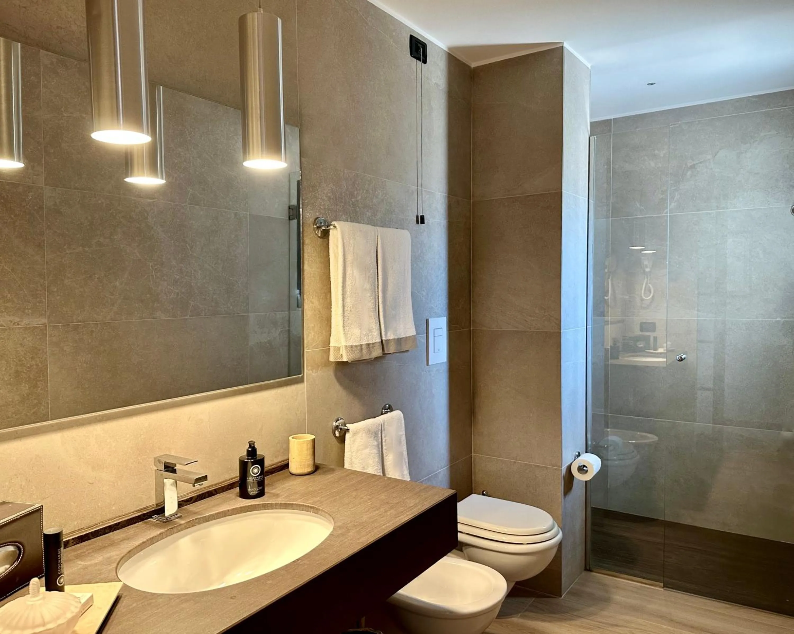 Bathroom in Hotel Capo San Vito by Geocharme