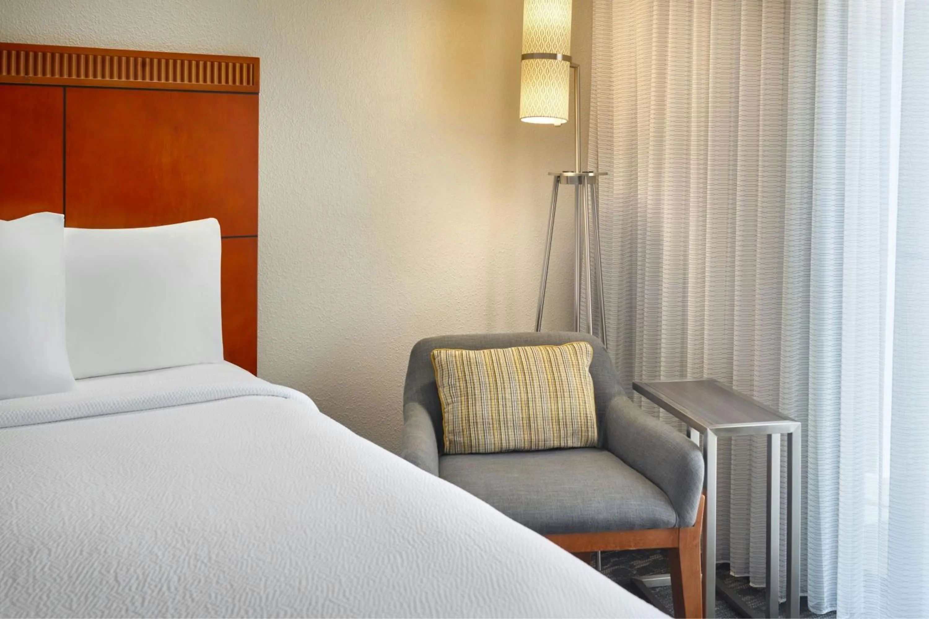 Photo of the whole room, Bed in Courtyard by Marriott Atlanta Airport South/Sullivan Road