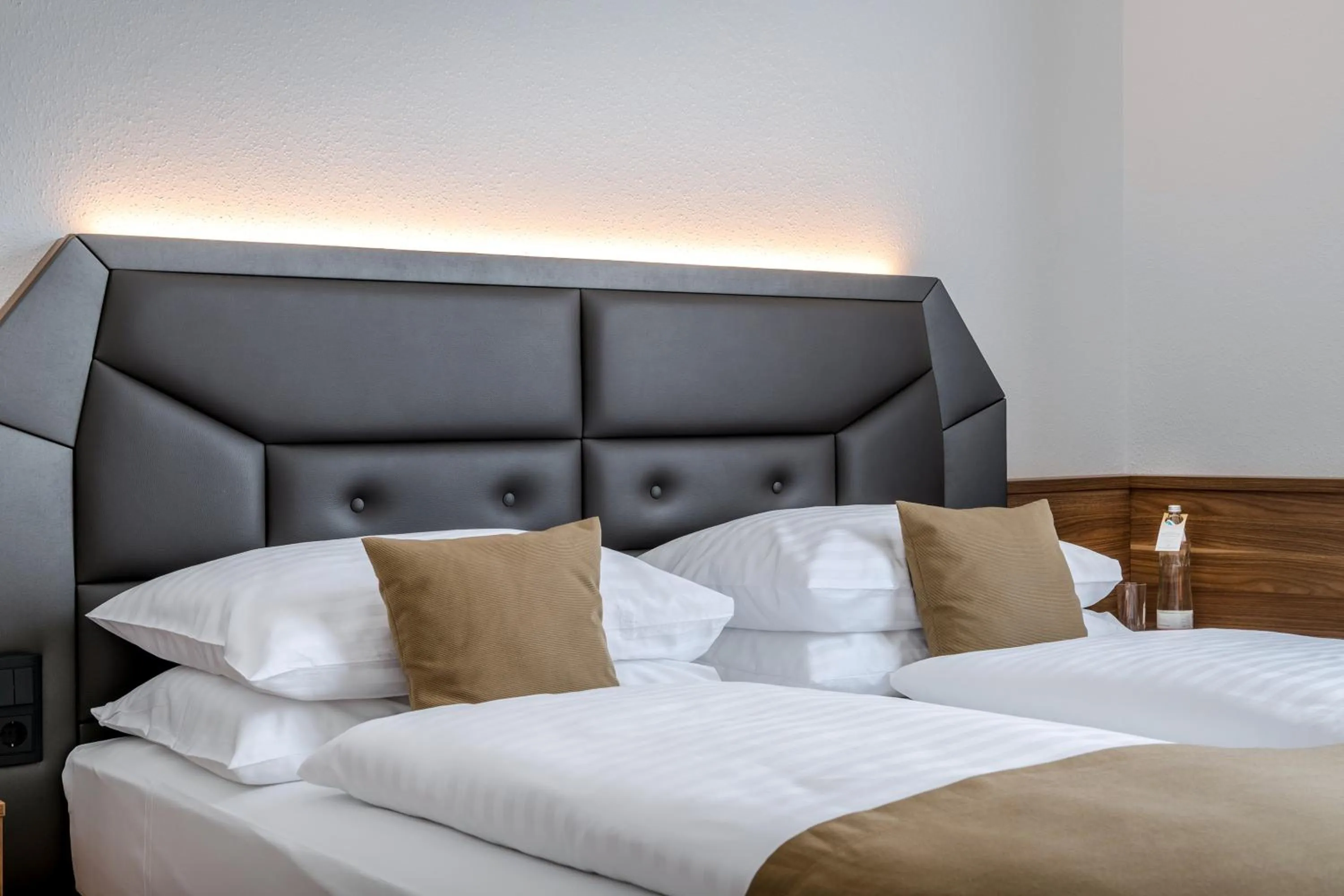 Bed in IMLAUER Hotel Nestroy Wien