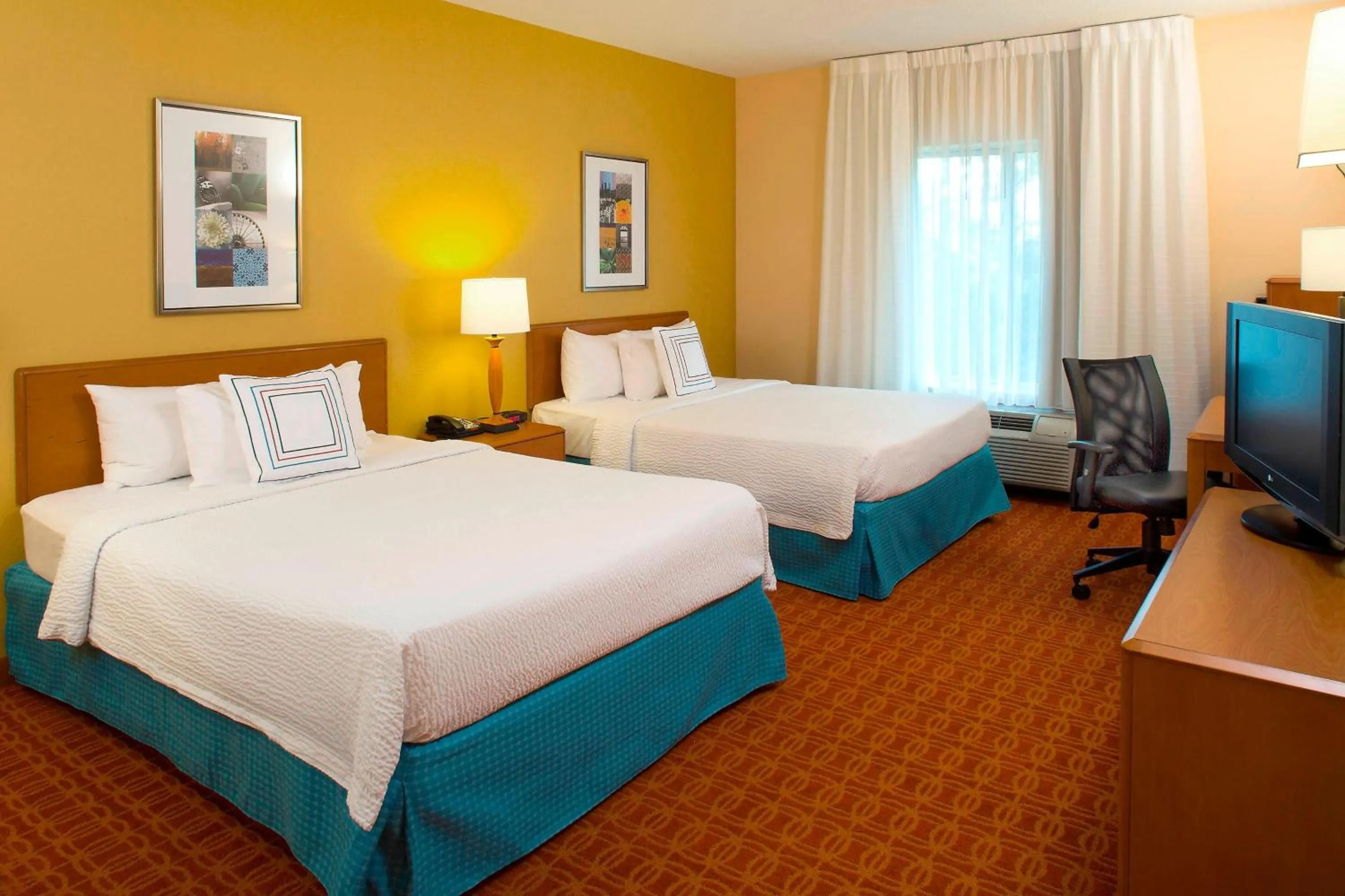 Photo of the whole room, Bed in Fairfield Inn & Suites Atlanta McDonough