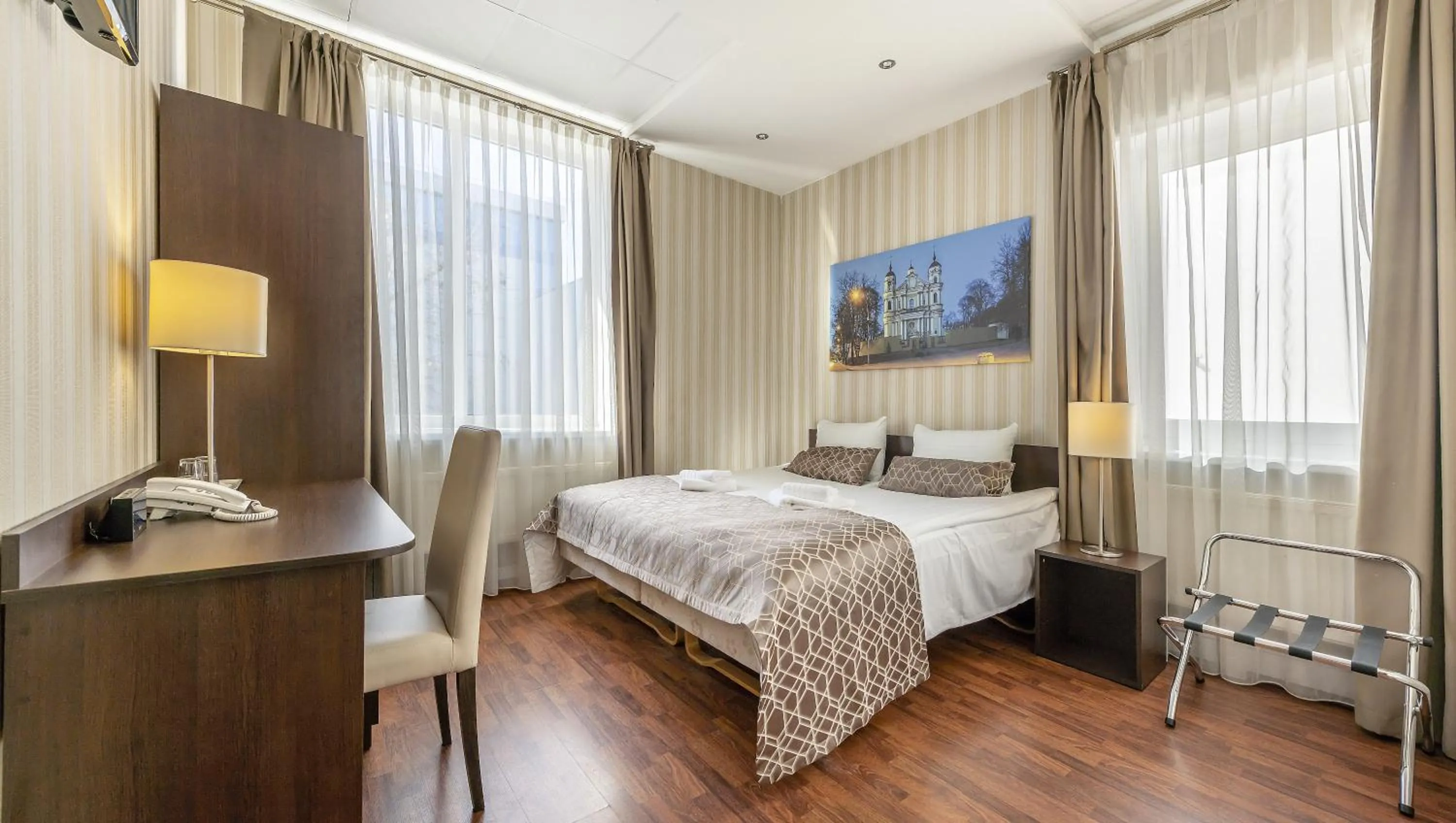 Living room, Bed in Vilnius City Hotel