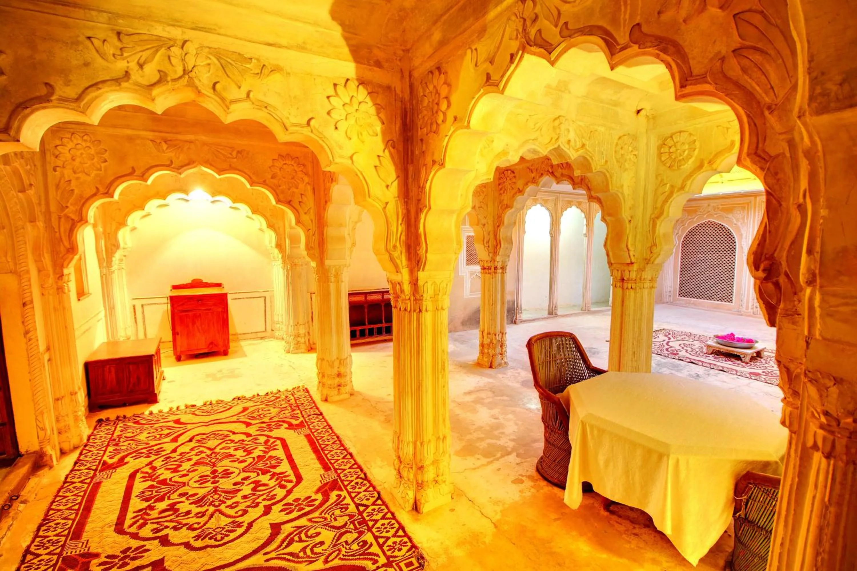 Seating area, Bed in The Fort Pokaran