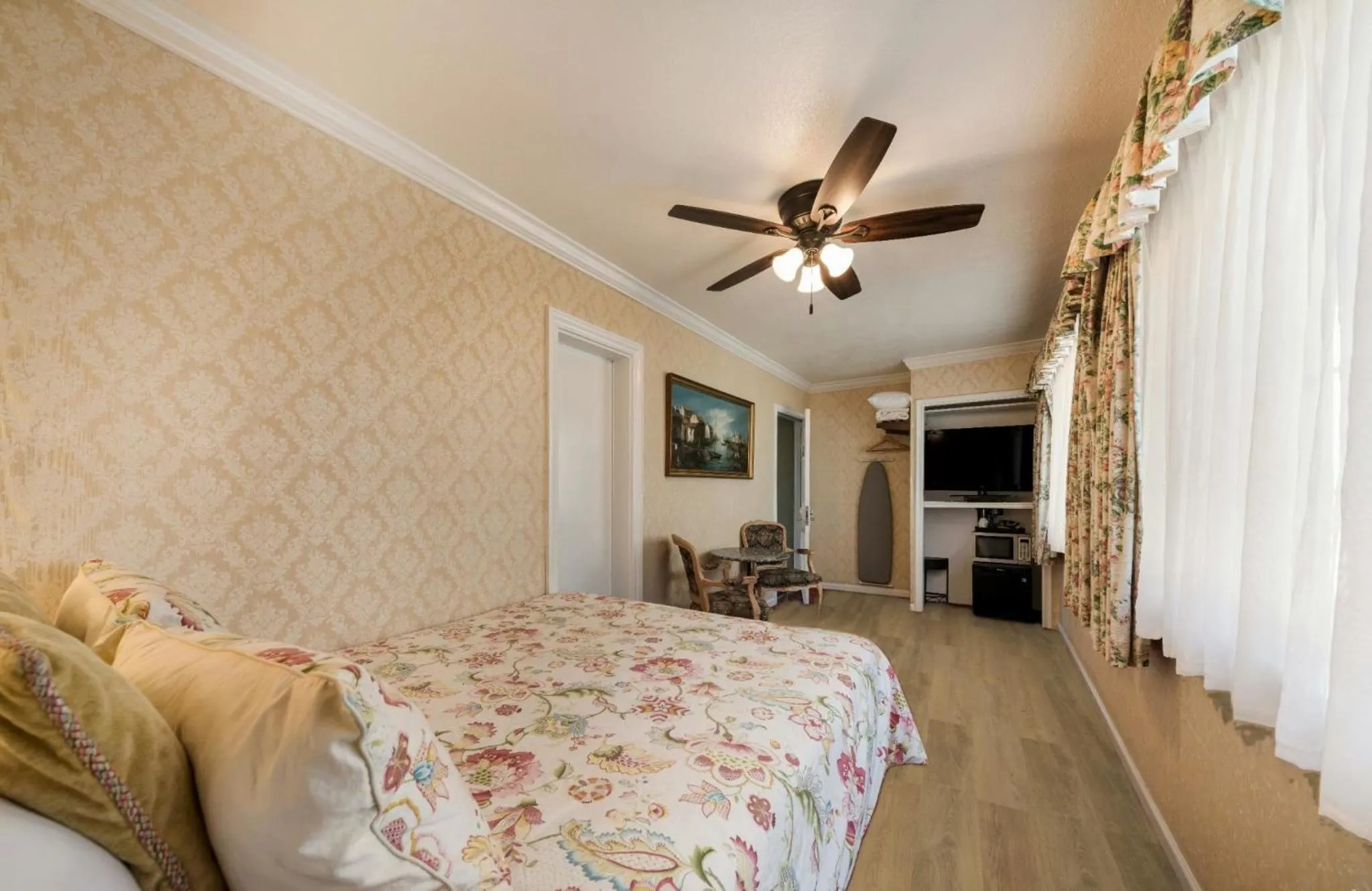 Bed in Carmel Inn & Suites