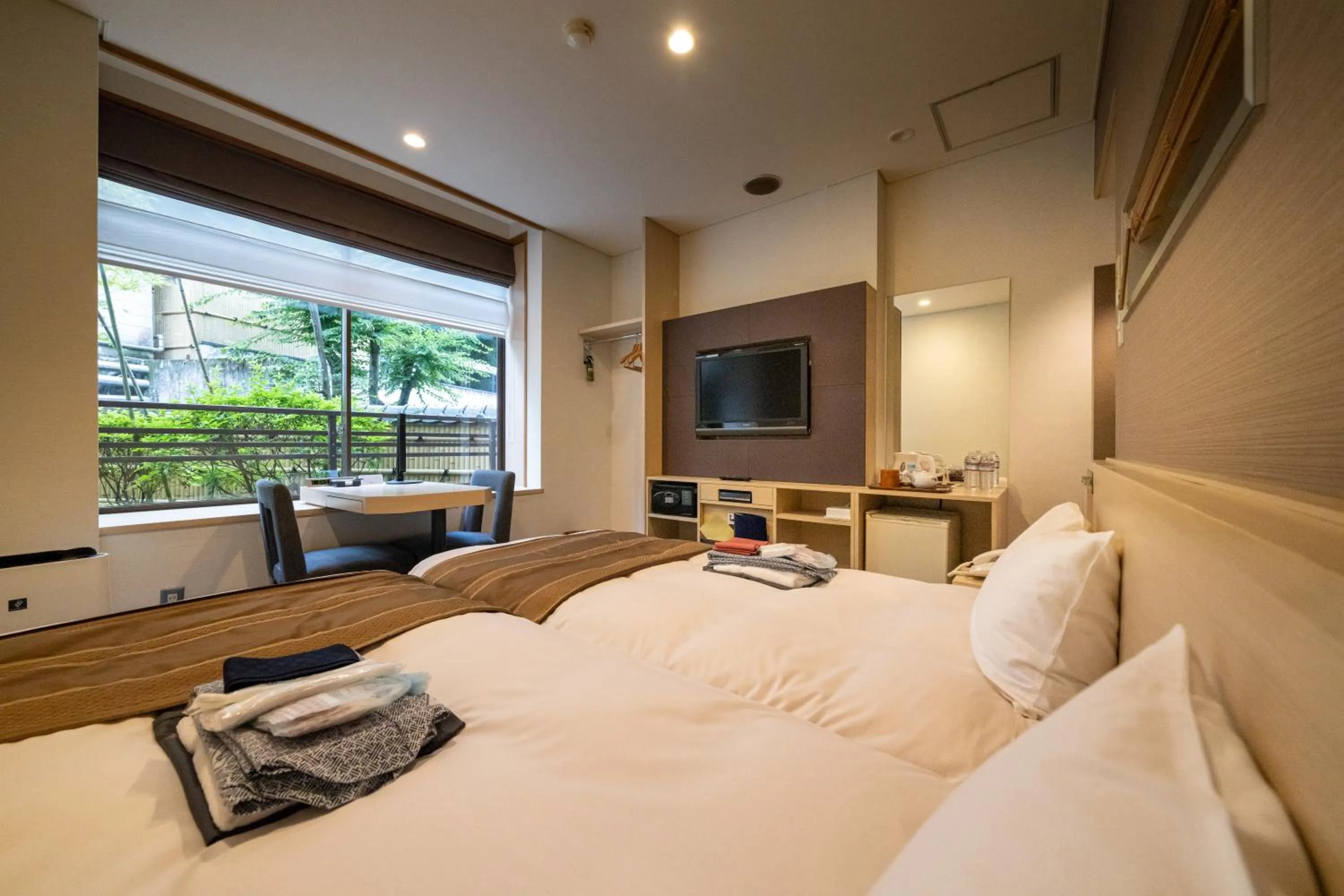Bed in Miyajima Grand Hotel Arimoto