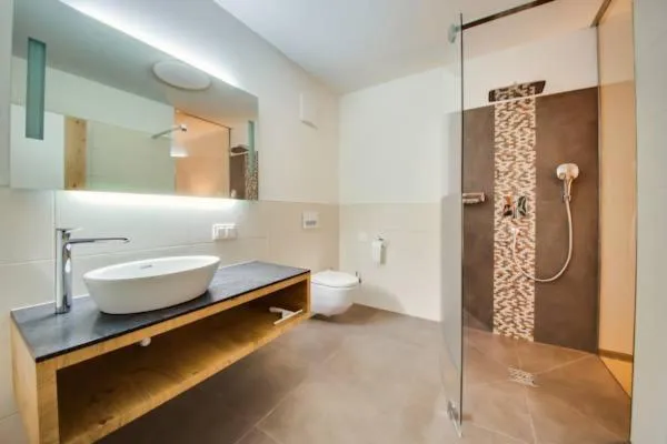 Bathroom in R&R Residenzen Aparthotel