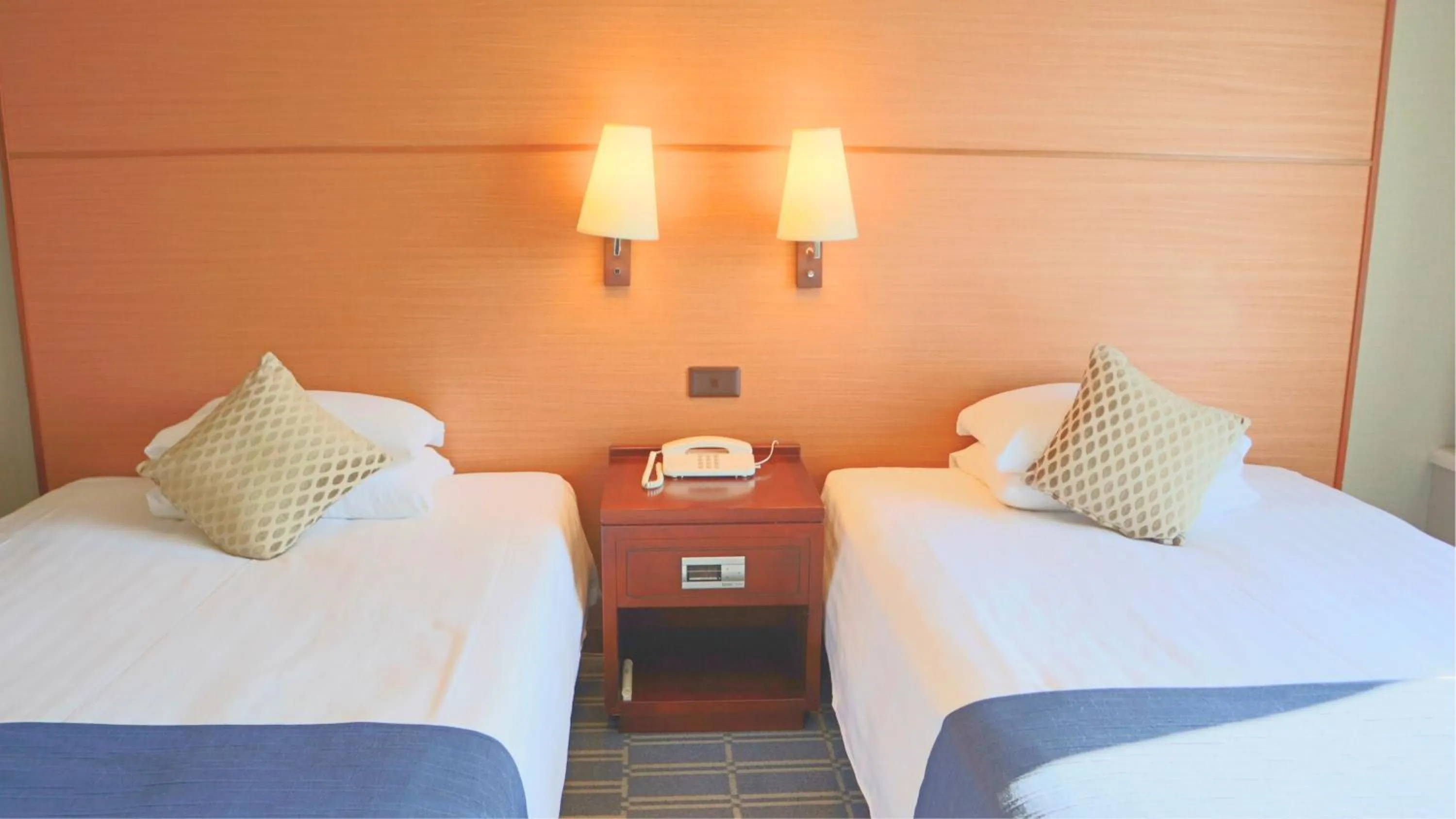 Bed in Premier Hotel Nakajima Park Sapporo